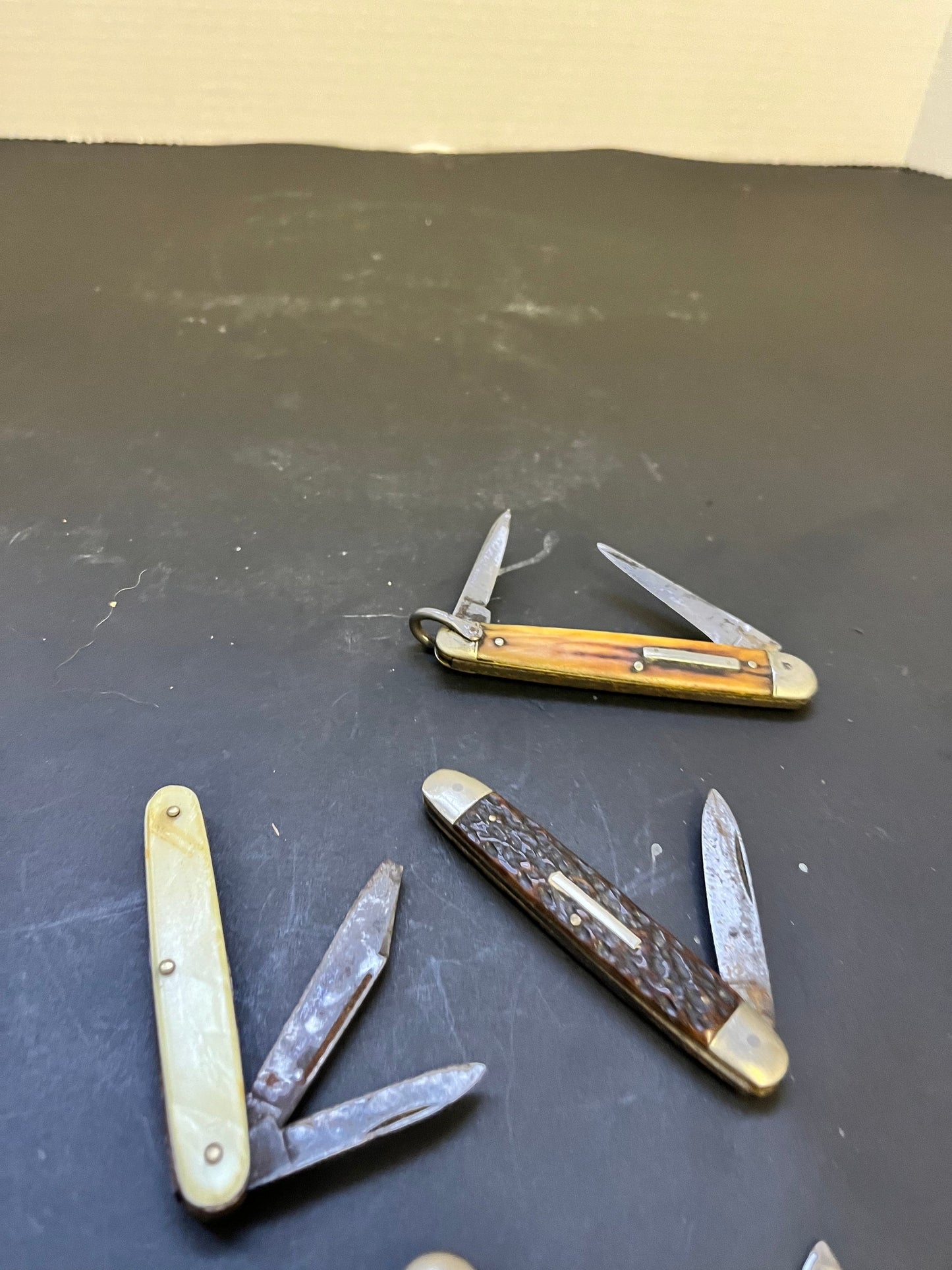 Group of four antique penknives