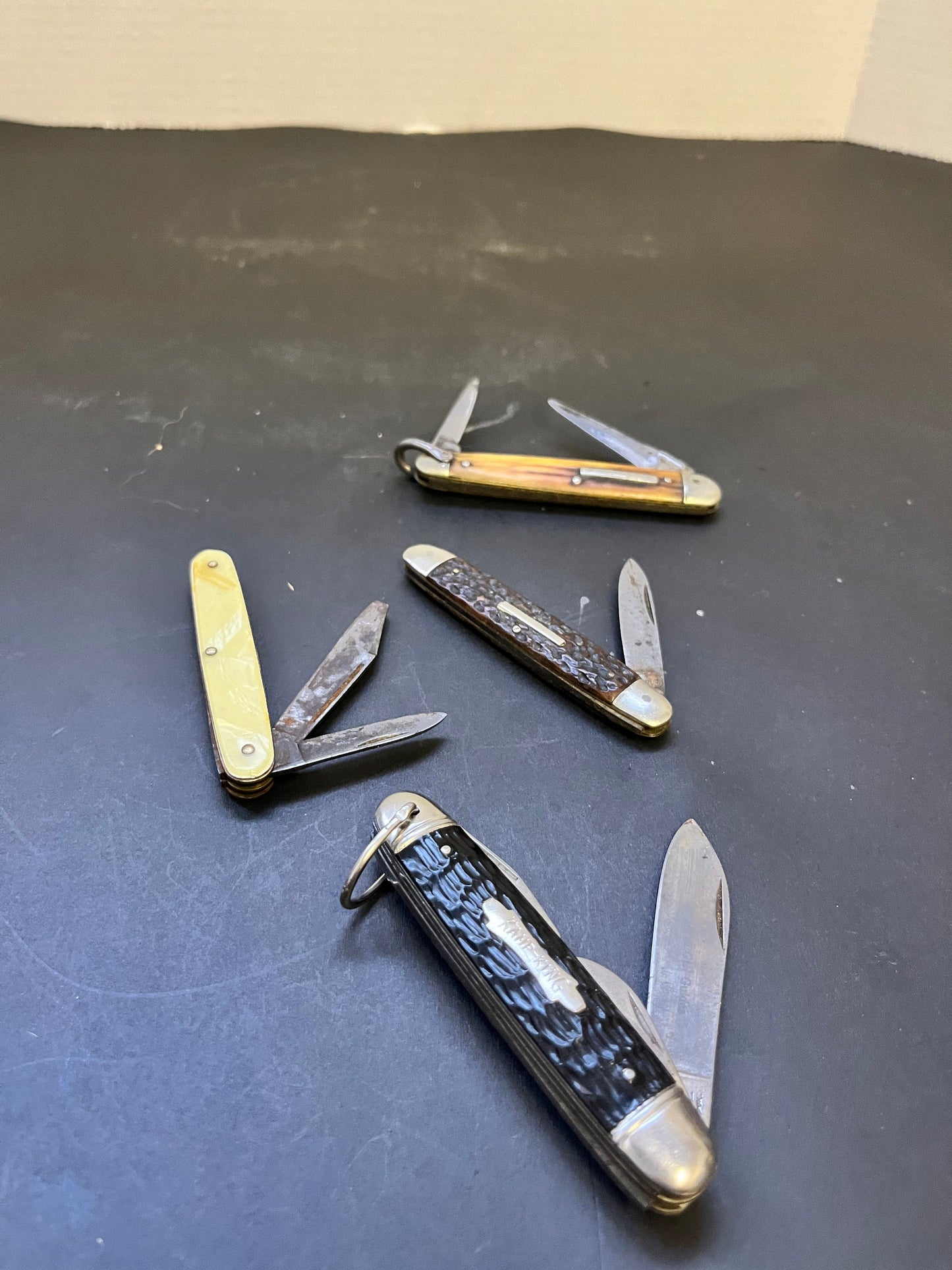 Group of four antique penknives