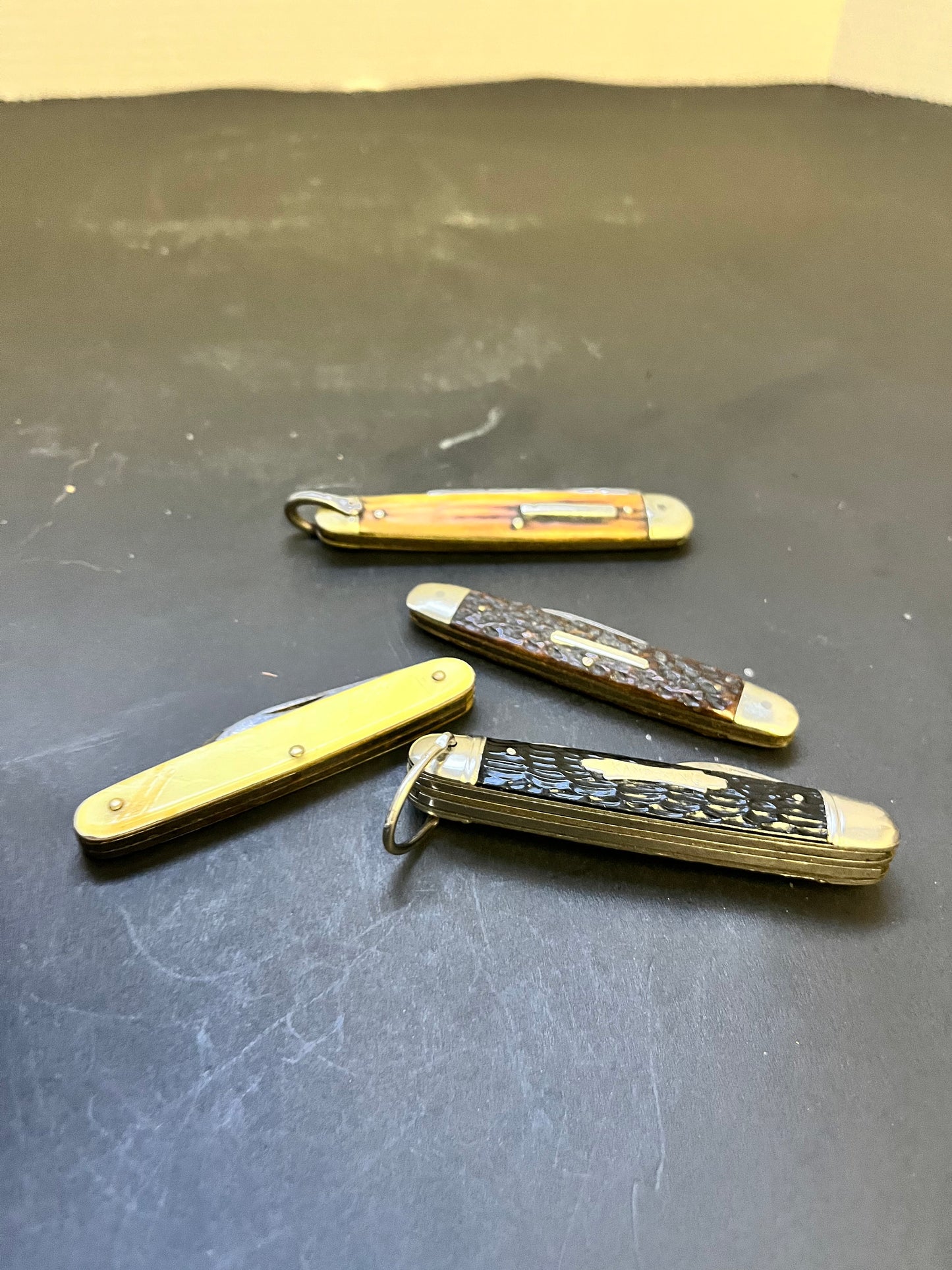 Group of four antique penknives