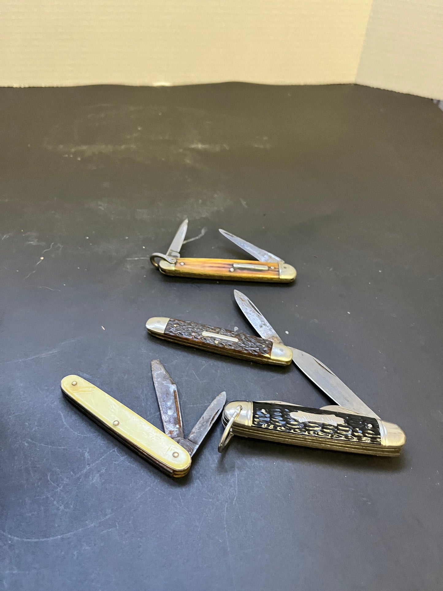 Group of four antique penknives