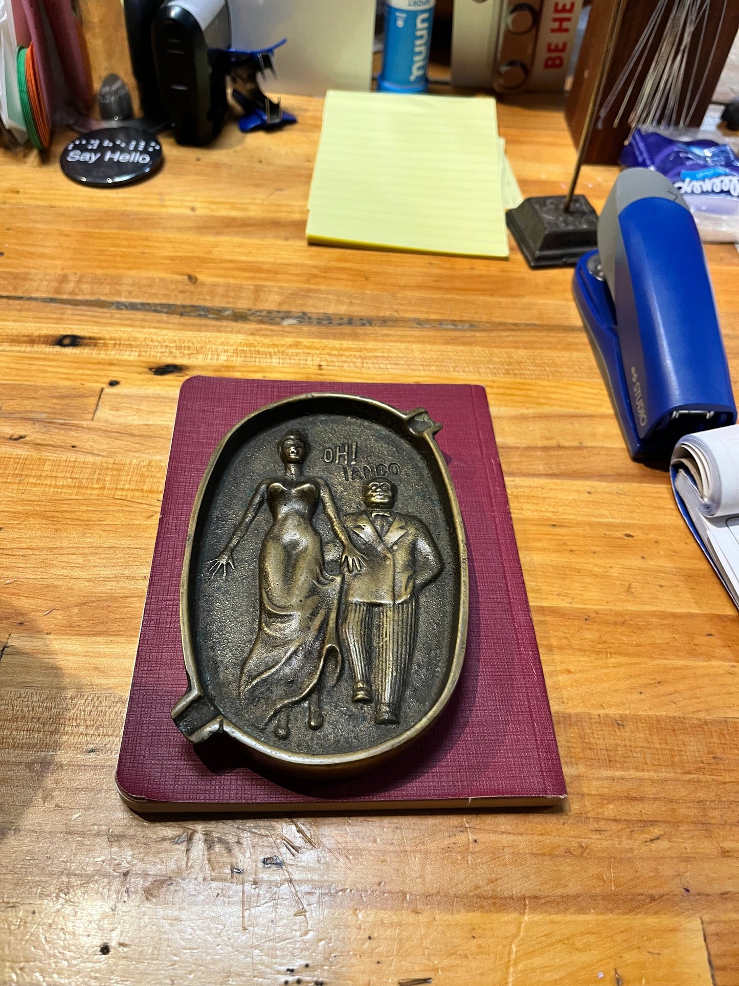 5.5 inch long  antique naughty bronze ashtray  amazing patina and such a cool piece.