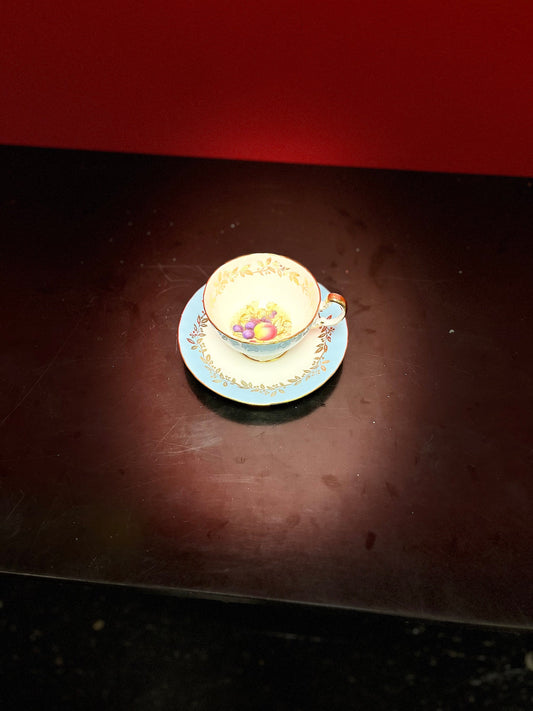 Lovely Unusual Aynsley fruit decorated cup and saucer in mint condition at great value.