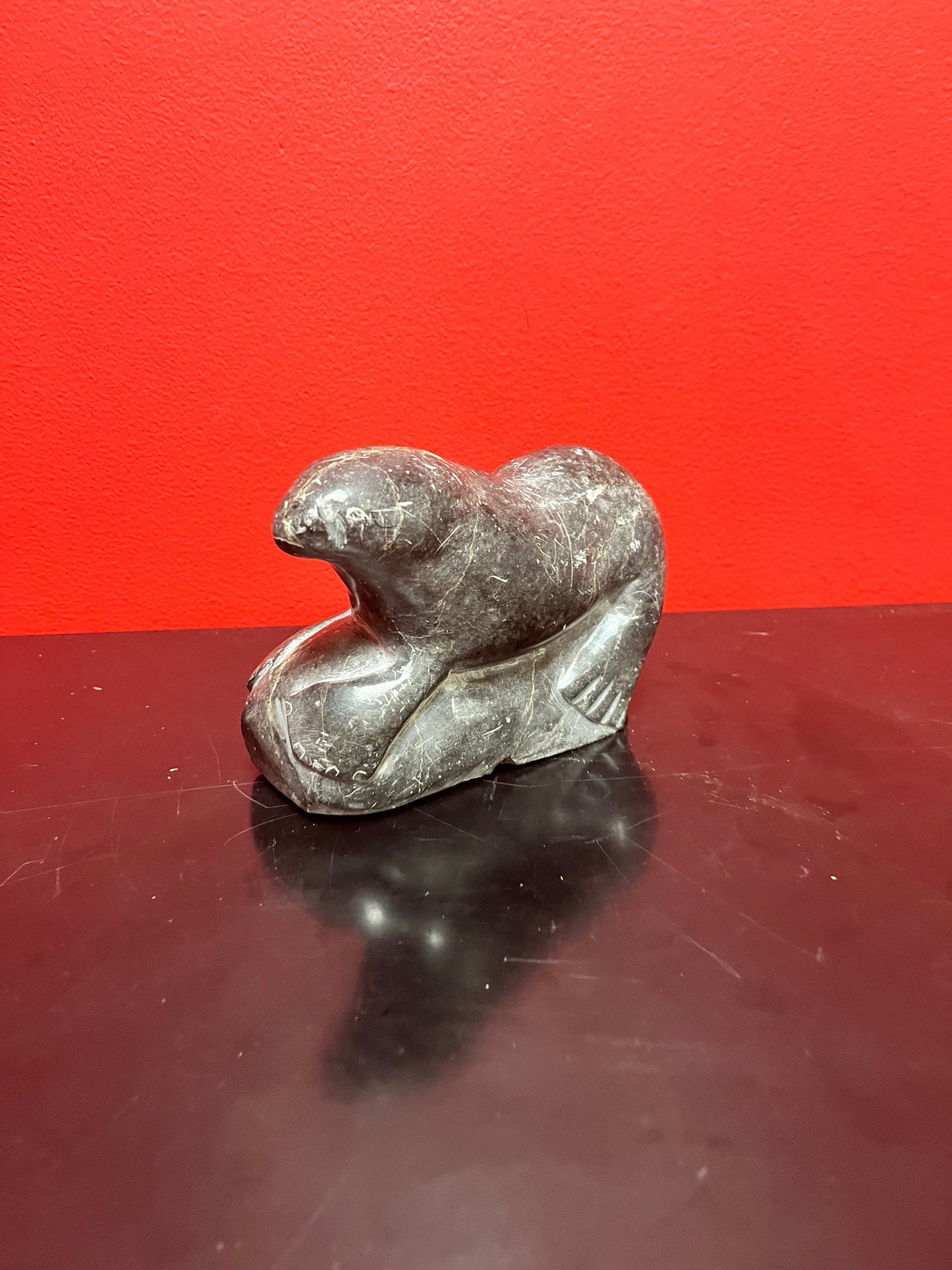 Antique indigenous Inuit, 7 x 4 stunning, soapstone hunting seal  with sticker and number  wow  good antique condition