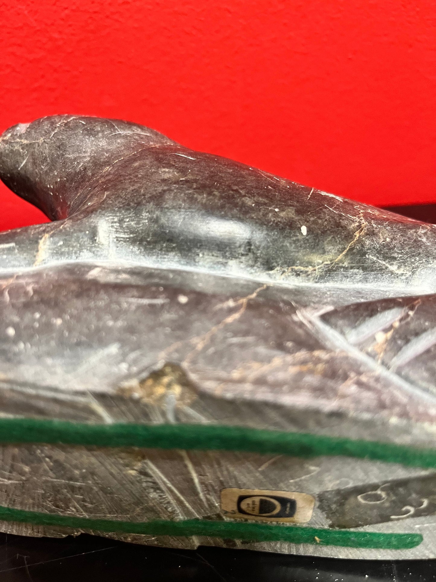 Antique indigenous Inuit, 7 x 4 stunning, soapstone hunting seal  with sticker and number  wow  good antique condition