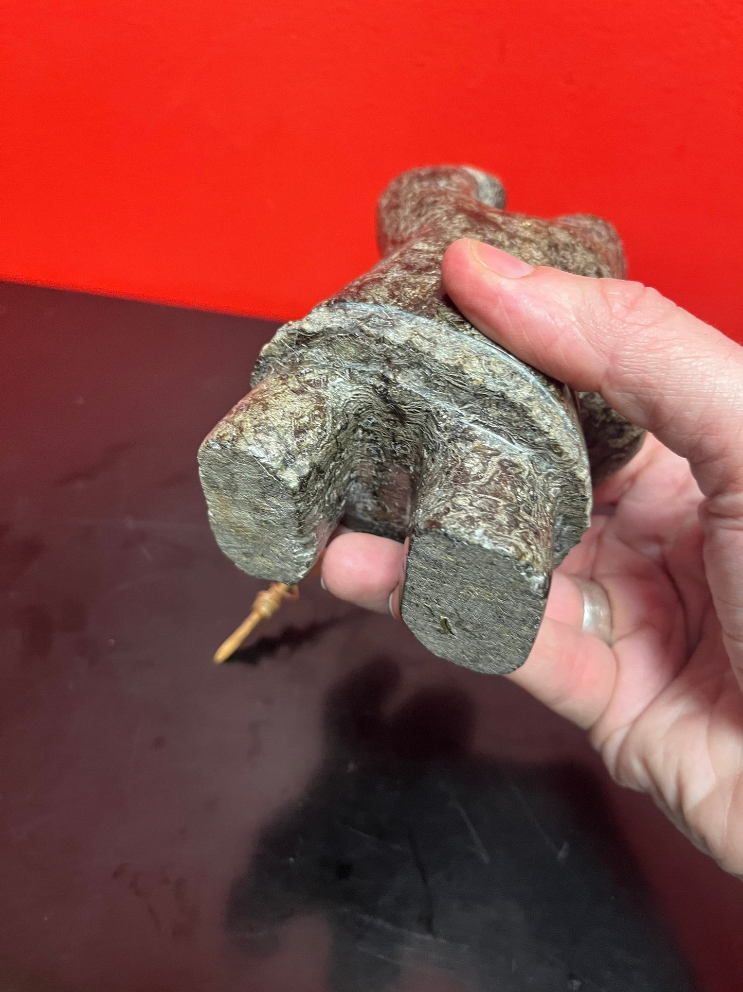 A  Fabulous 6 inch tall, authentic indigenous Inuit soapstone hunting statue with carved bone face  antique Inuit soapstone