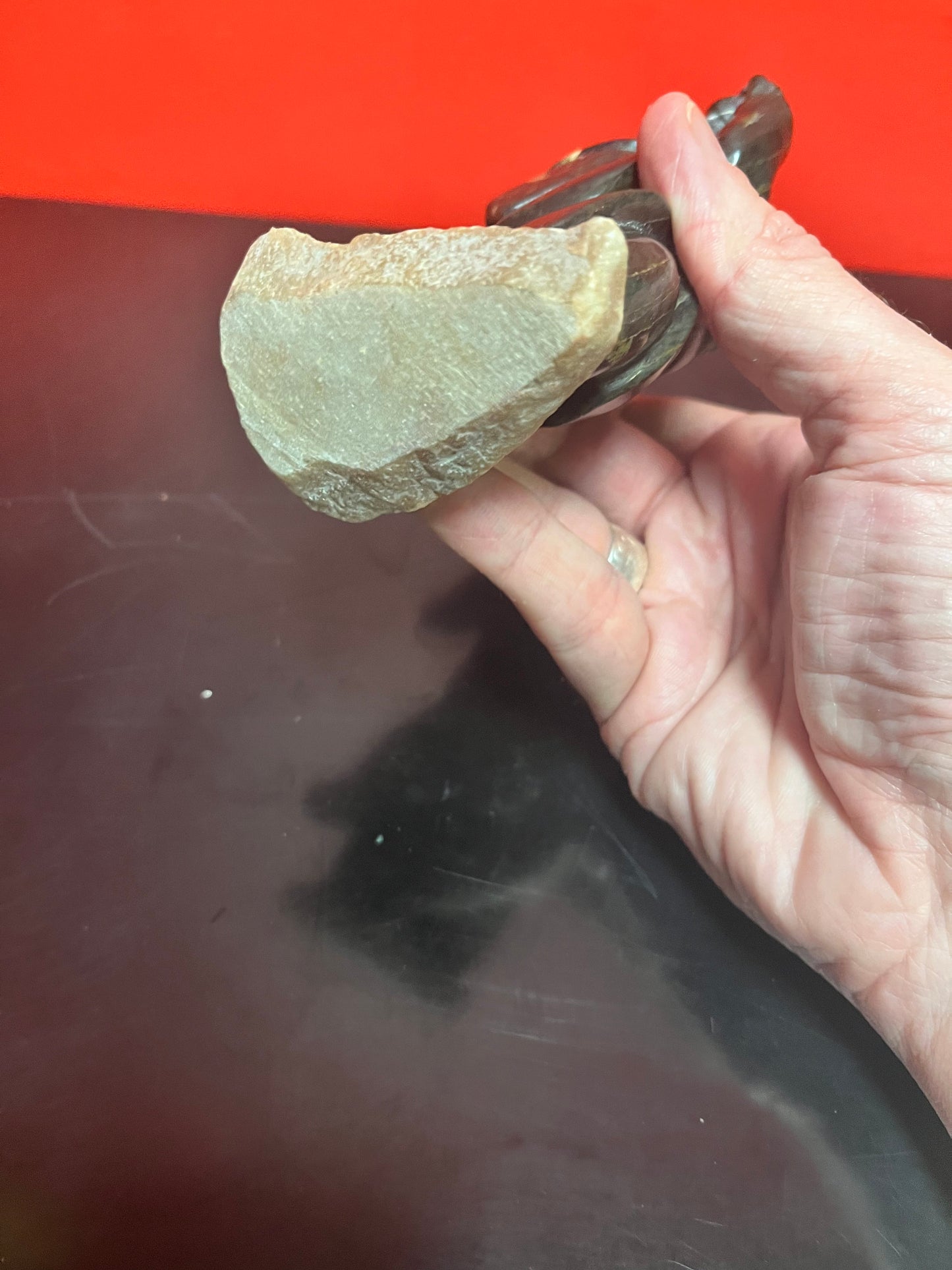 Beautiful 6 inch tall, vintage, indigenous, Inuit soap, stone statue of a hunter carrying child on Stone base   delicious piece