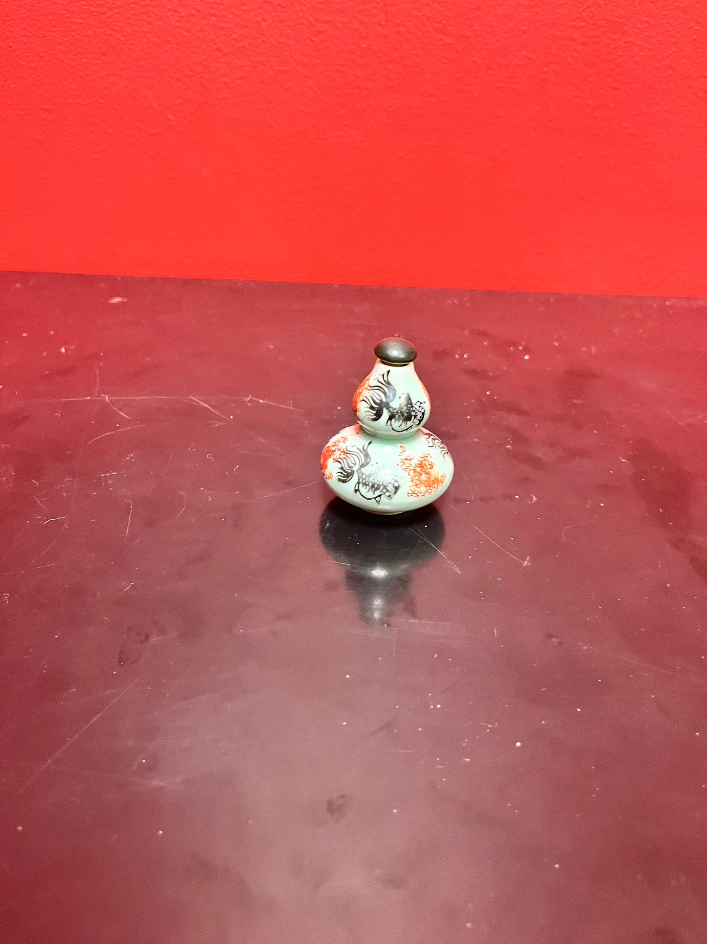 An  Antique Chinese 3 inch high double barrelled porcelain snuff bottle with koi fish and flowers - great value