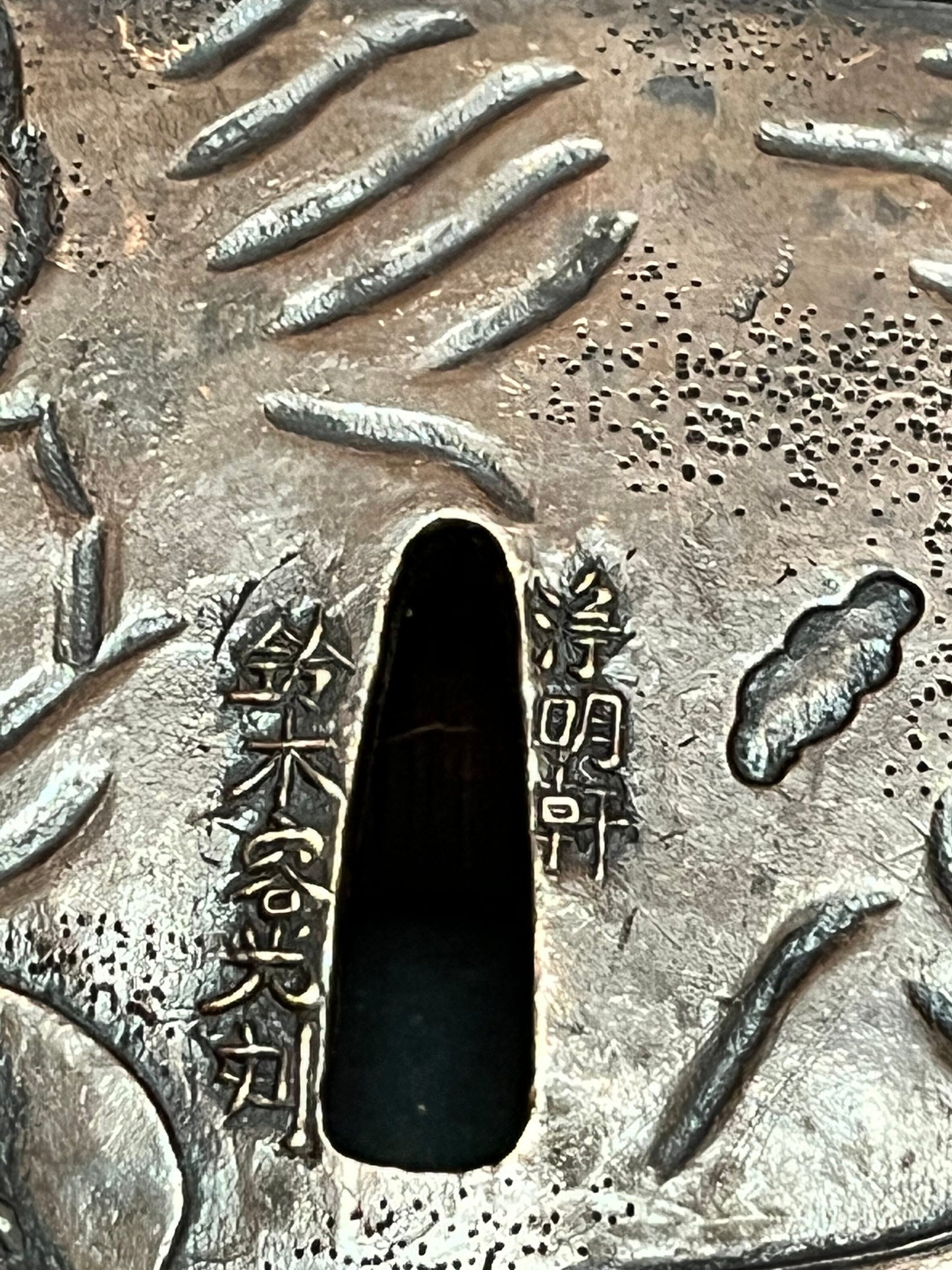 A  Stunning 4 inch, 19 century bronze Japanese  tsuba  geisha fighting a demon signed the best of the best