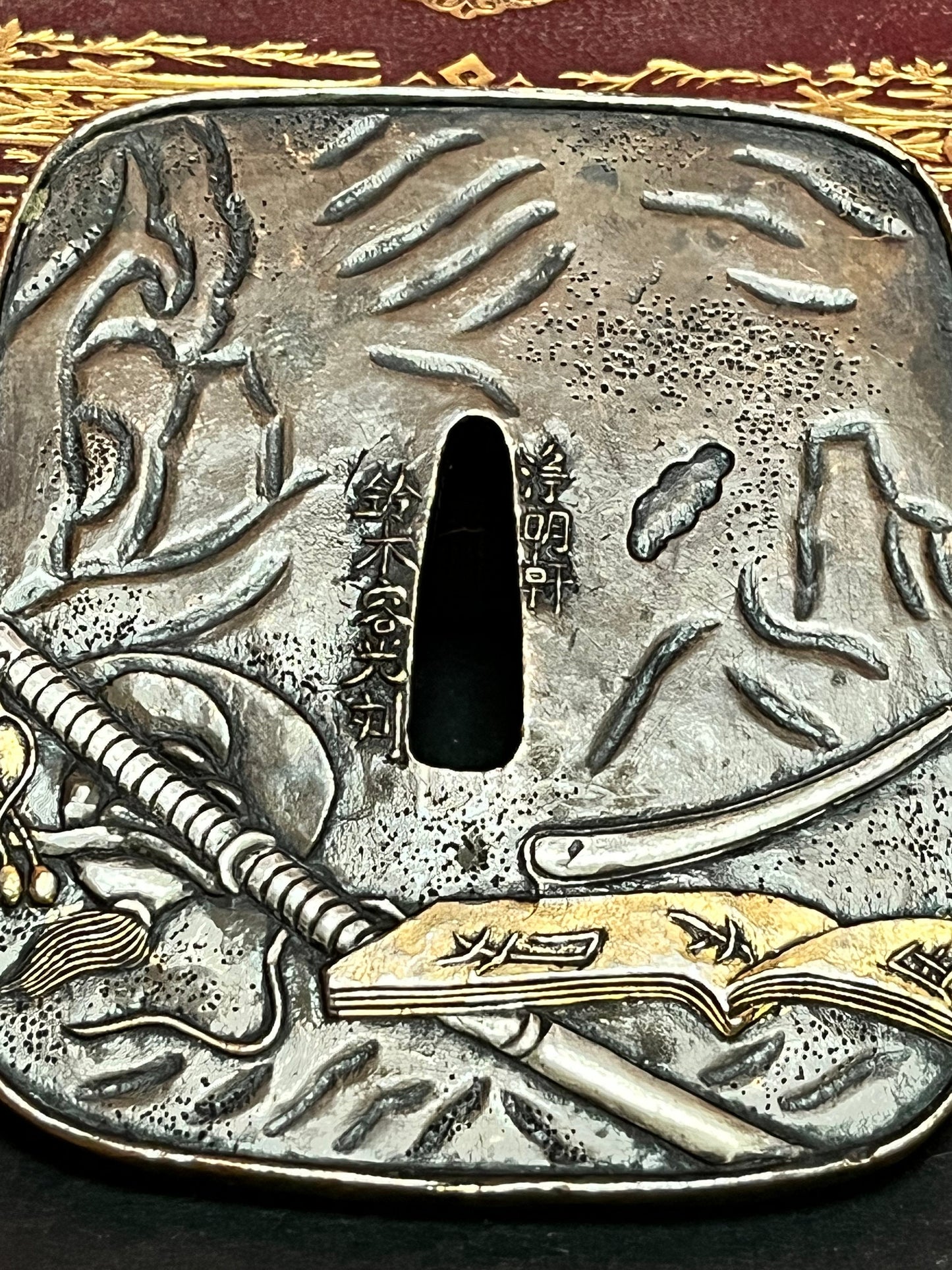 A  Stunning 4 inch, 19 century bronze Japanese  tsuba  geisha fighting a demon signed the best of the best