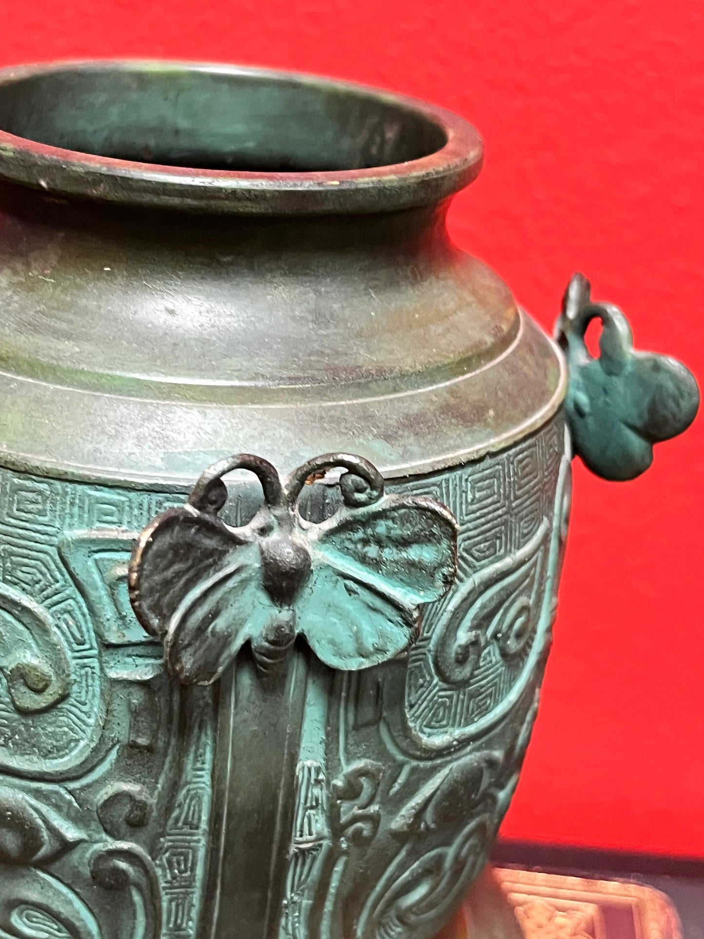 6 inch high Chinese bronze heavy butterfly decorated vase  wonderful quality and  Patina
