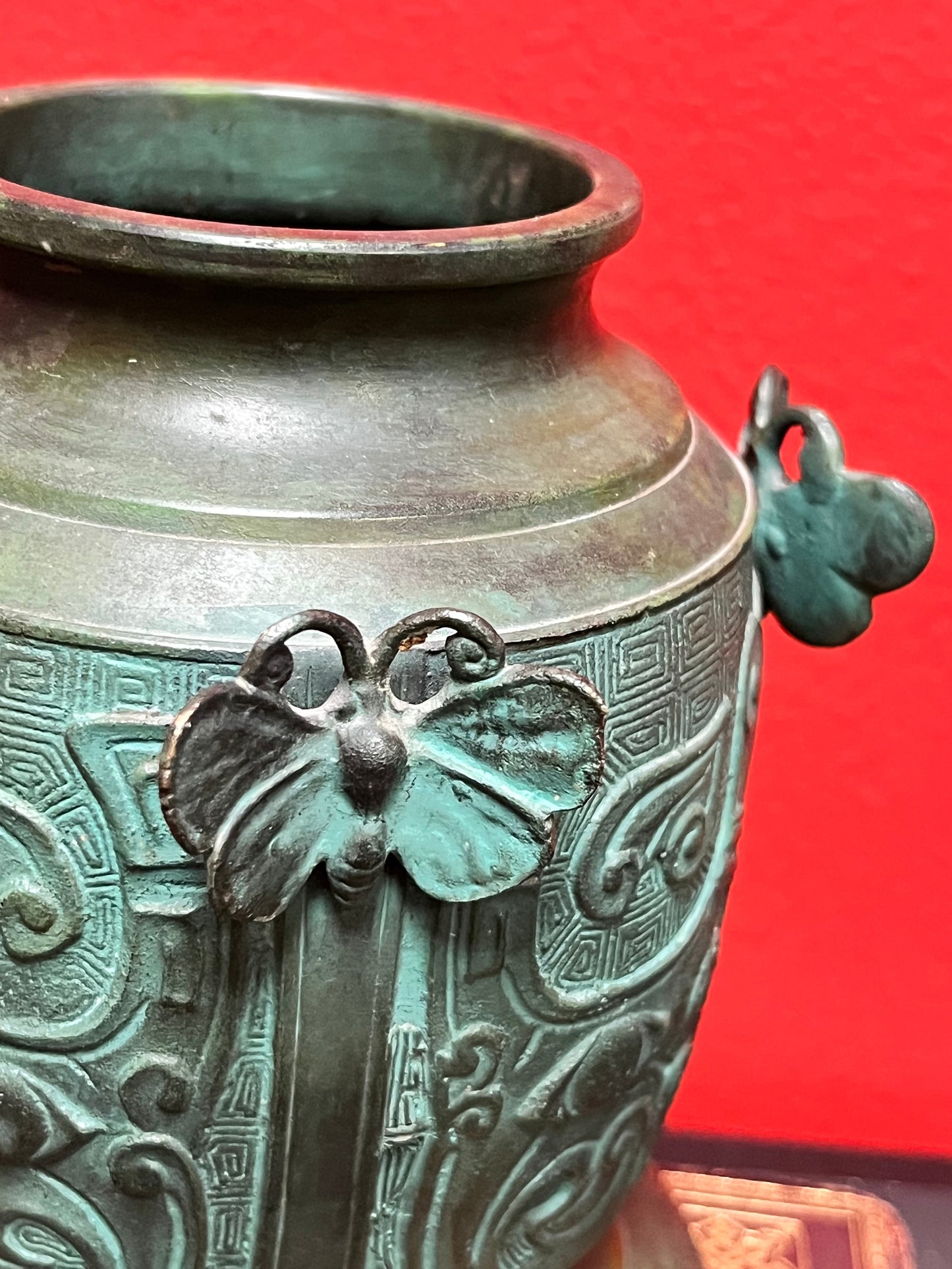 6 inch high Chinese bronze heavy butterfly decorated vase  wonderful quality and  Patina