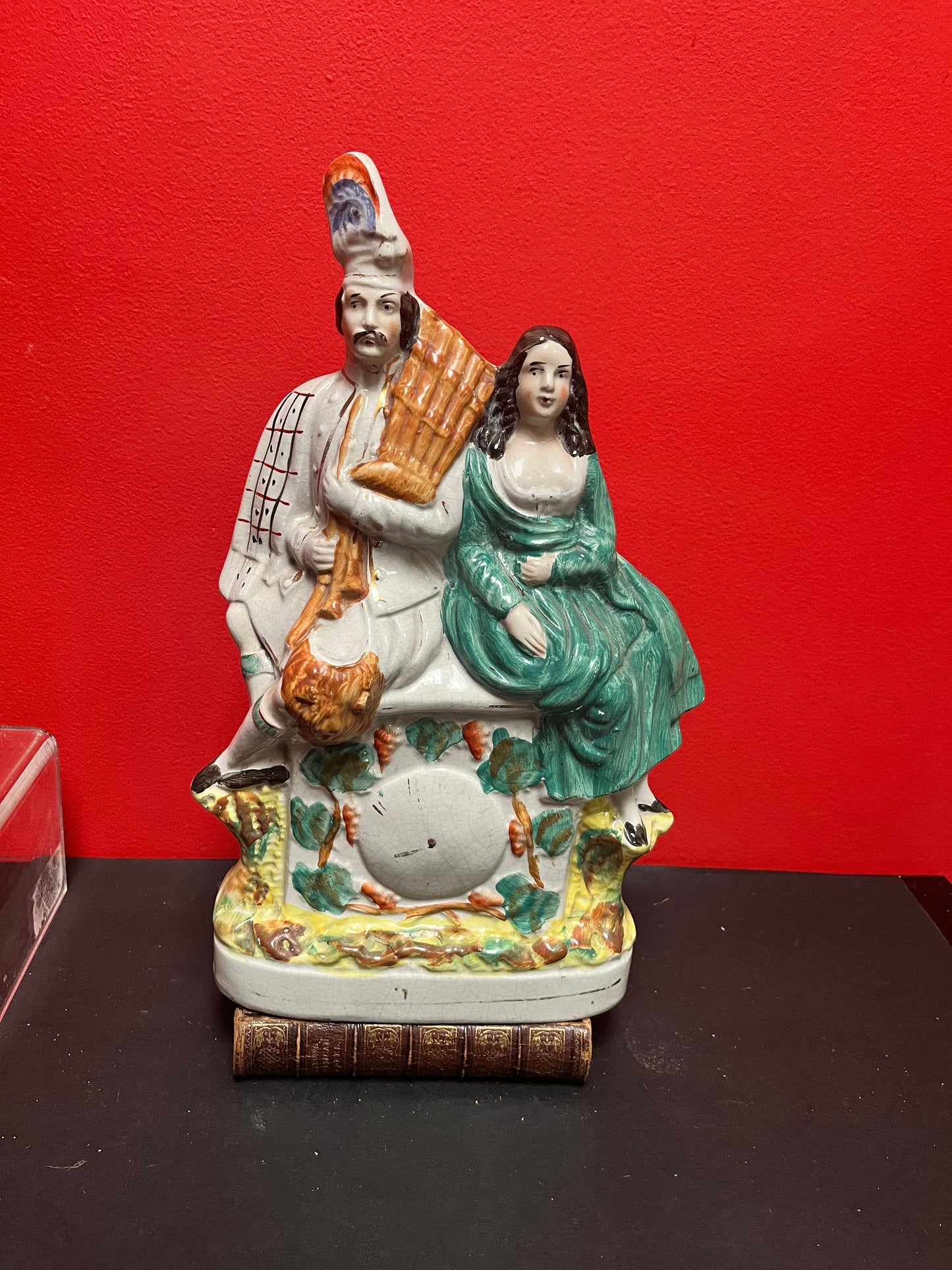 A fabulous, 15 inch high authentic English Staffordshire statue of a couple seated upon a clock  crazing - wow
