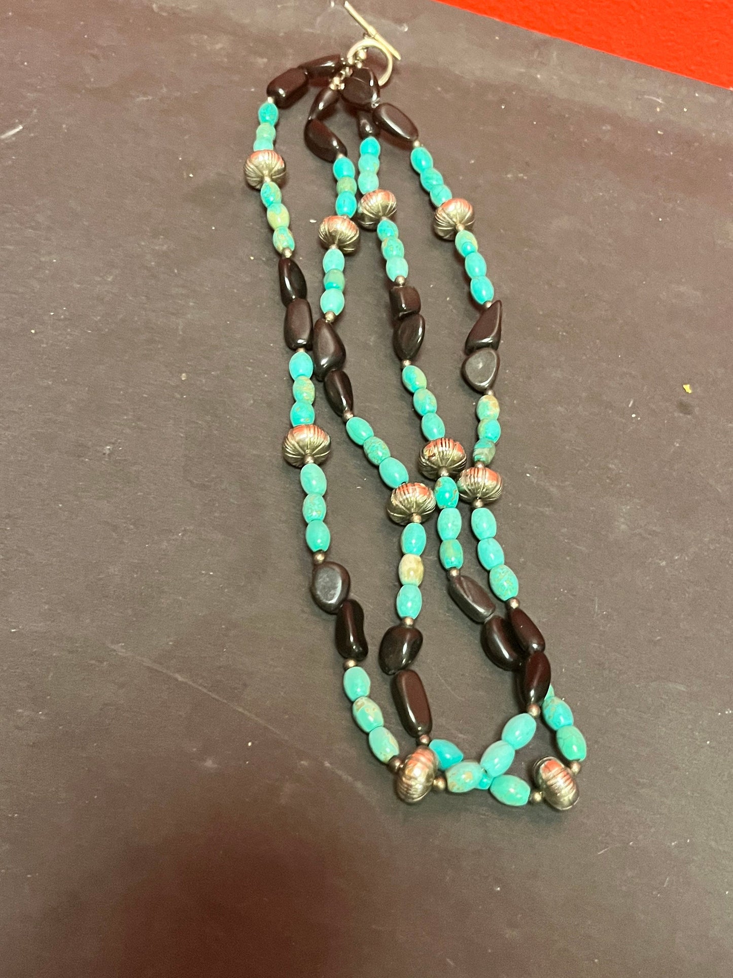 Approximately 18 inches long total 36 inch double strand, turquoise,  silver and jet black stone necklace