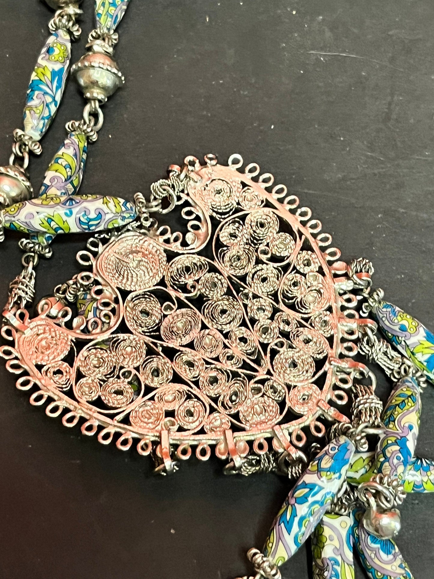 Approximately 26 inch necklace with 6 inch pendant  Asian silver filagree and pottery beads  very unusual and wonderful
