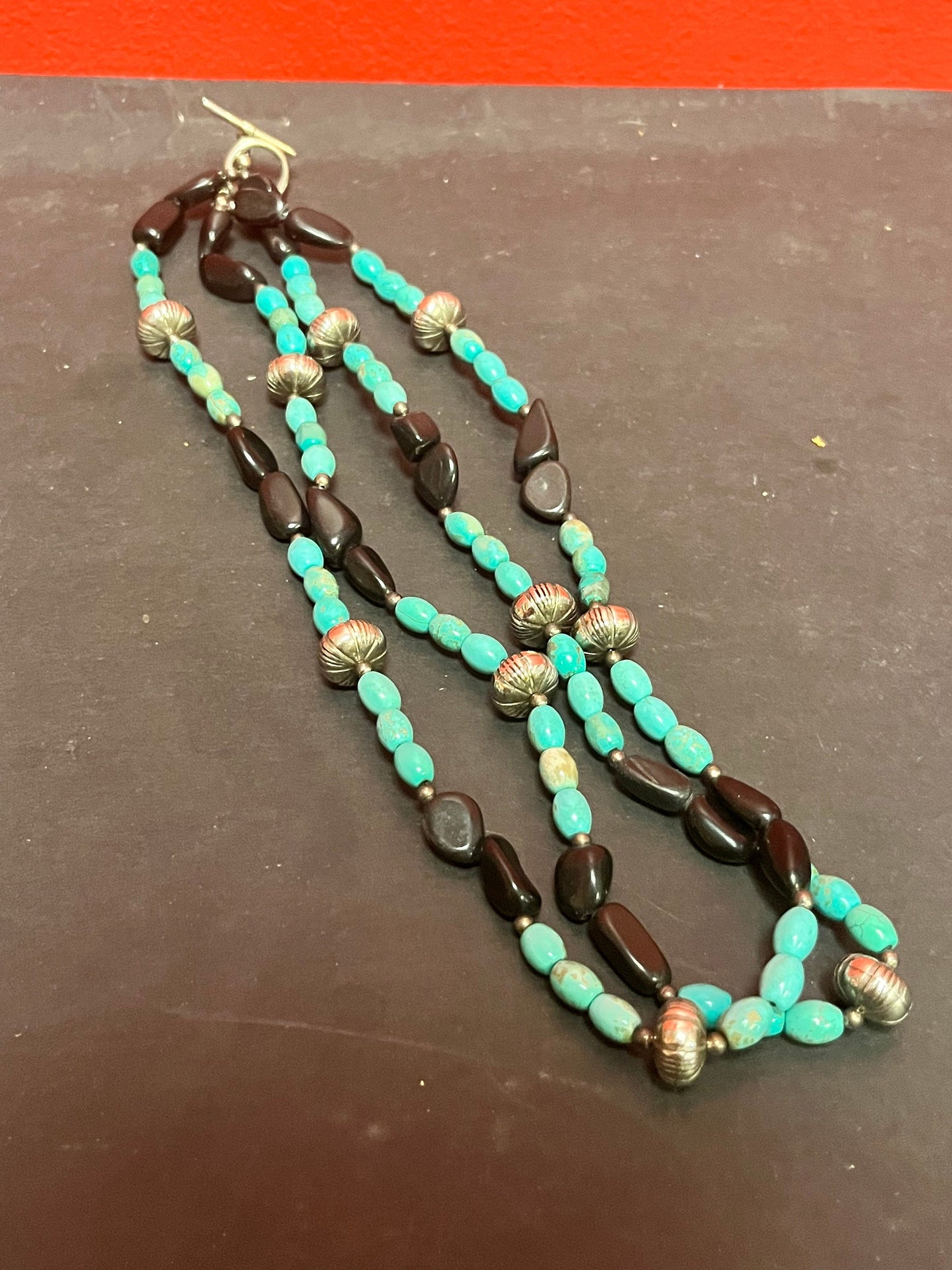 Approximately 18 inches long total 36 inch double strand, turquoise,  silver and jet black stone necklace