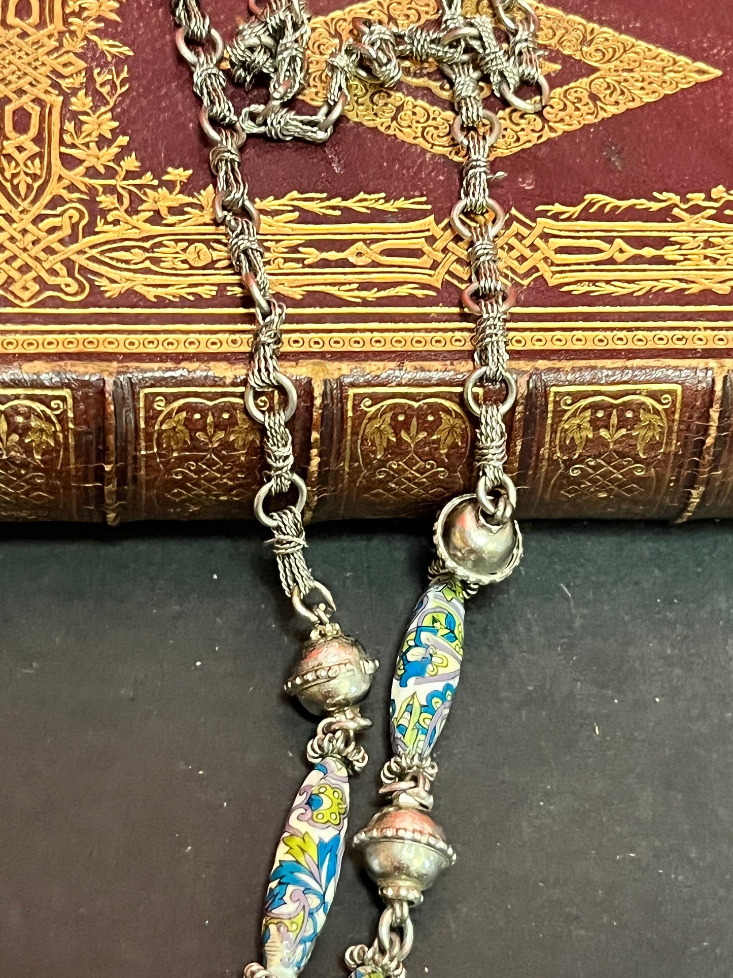 Approximately 26 inch necklace with 6 inch pendant  Asian silver filagree and pottery beads  very unusual and wonderful