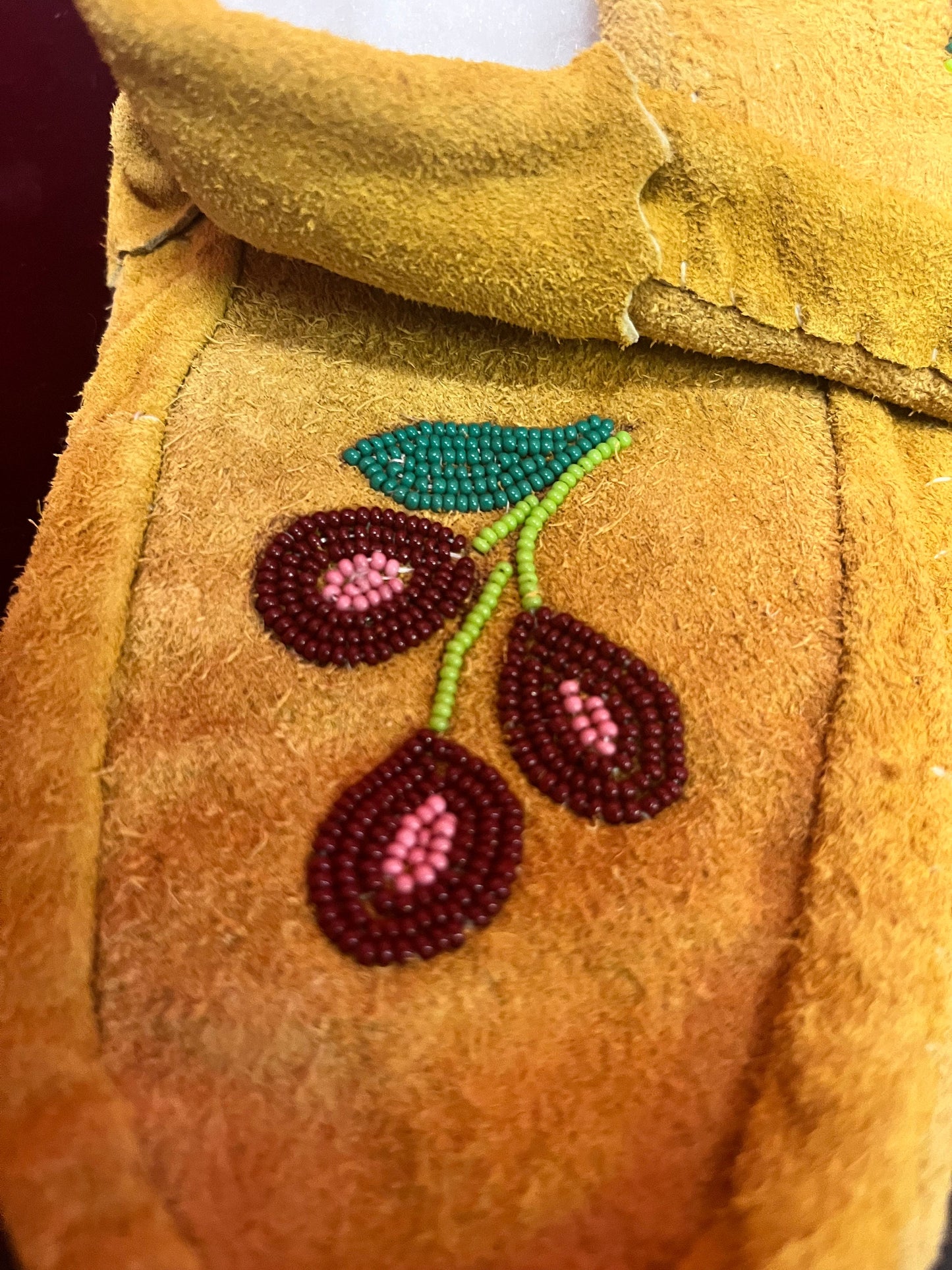 10 inch indigenous first nations leather and beaded moccasin shoes  like new condition  10 inches long
