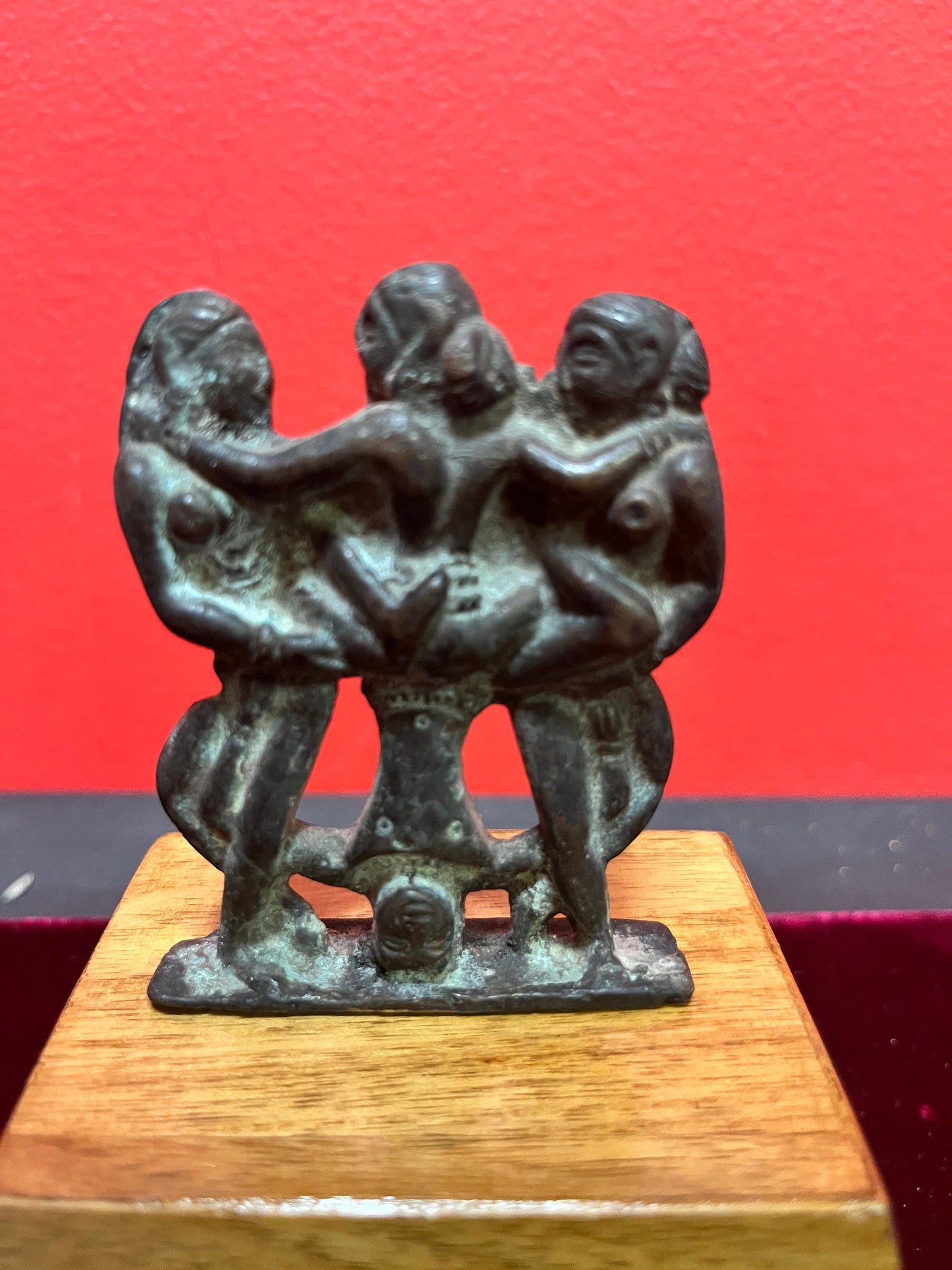 Museum quality  3 inch 18 century Indian karma Sutra bronze  on  3 inch wooden stand created later  great Patina  amazing piece