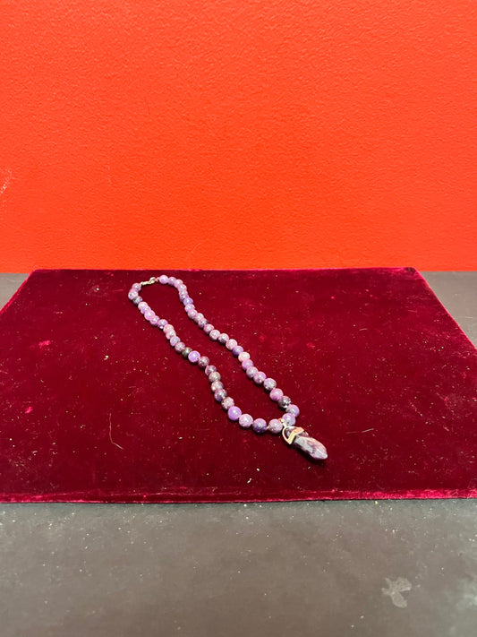 An  Approximately 17 inches long, amethyst necklace with amethyst pendant  wow