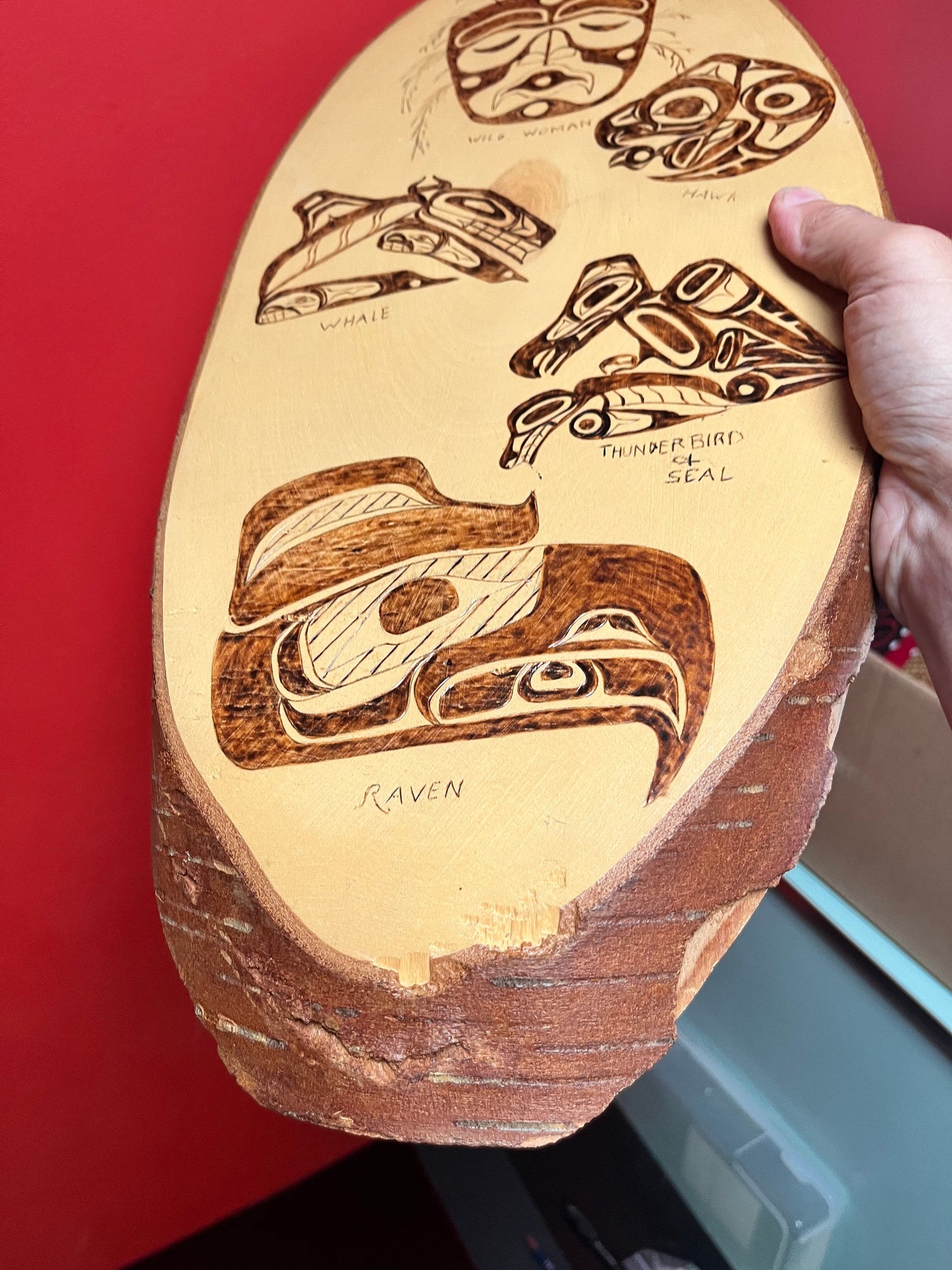 A 21 x 10 live edge, wood indigenous, first nations pacific northwest coast plaque  collaboration piece signed on back