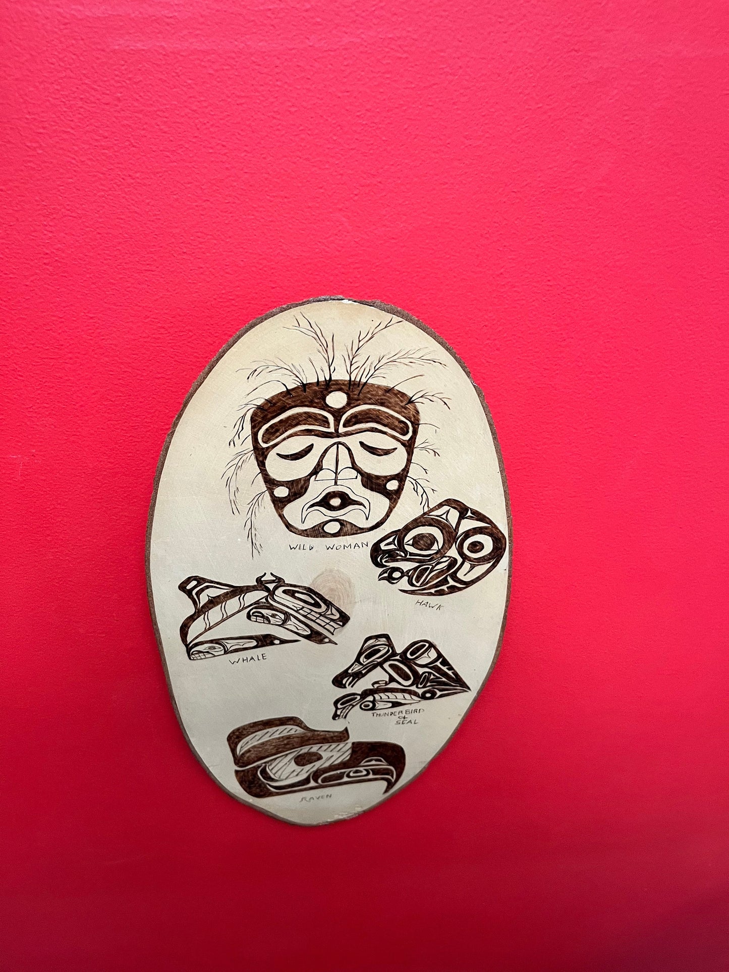 A 21 x 10 live edge, wood indigenous, first nations pacific northwest coast plaque  collaboration piece signed on back