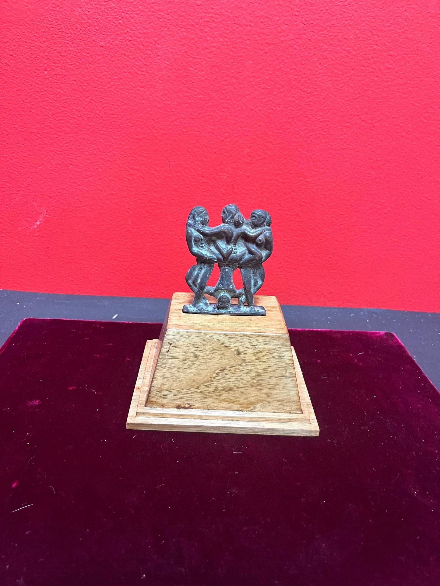 Museum quality  3 inch 18 century Indian karma Sutra bronze  on  3 inch wooden stand created later  great Patina  amazing piece