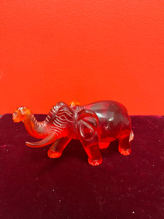 Lovely 6 inch long cherry amber elephant  good condition