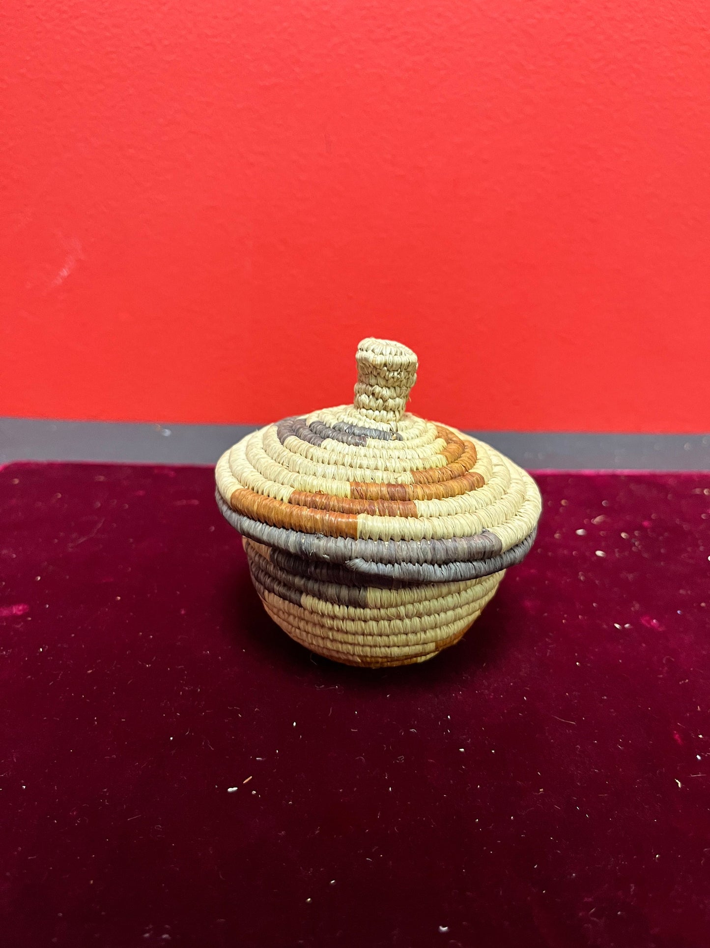 A  4 inch high Navajo southwestern woven lidded basket fabulous condition