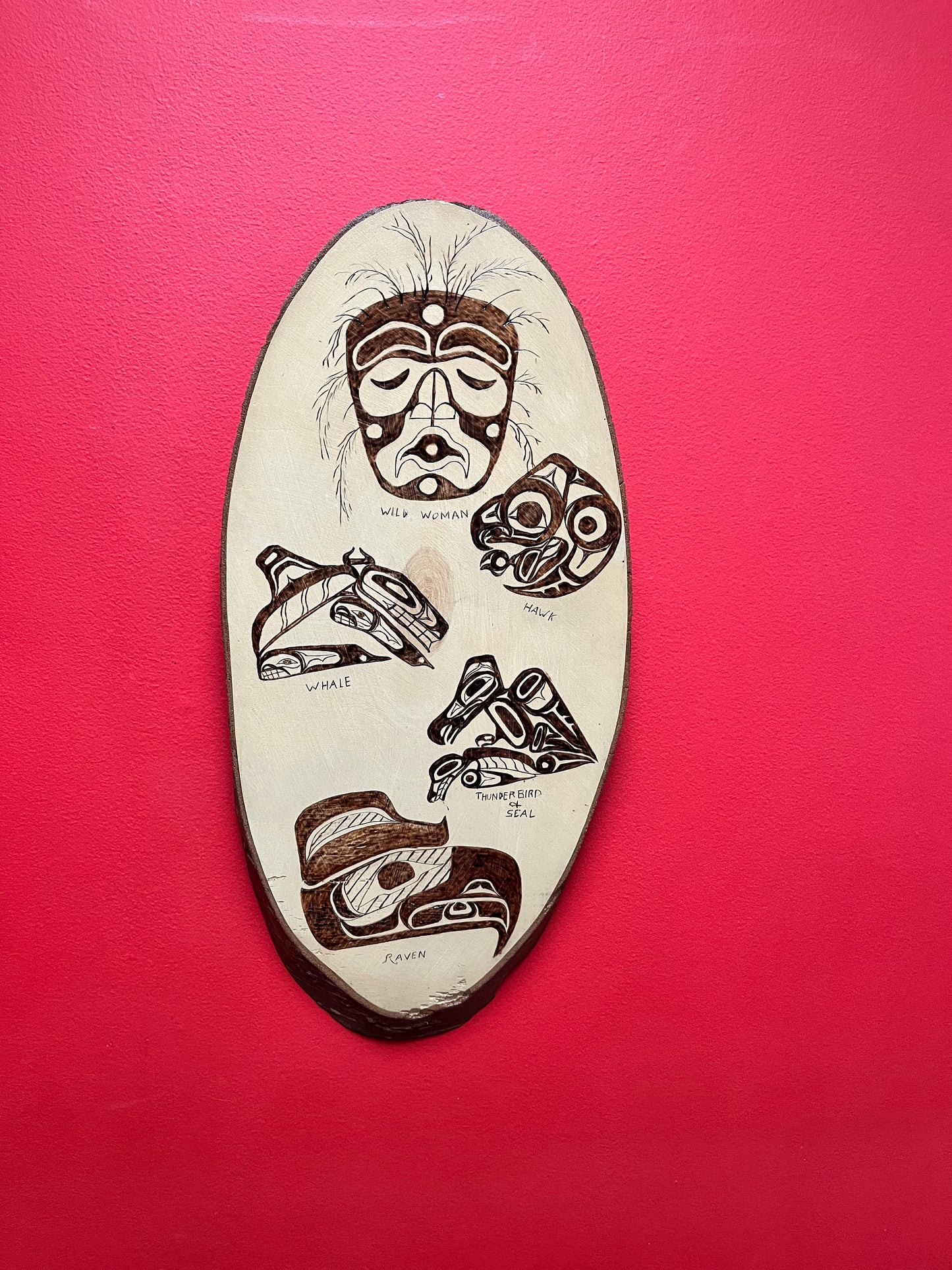 A 21 x 10 live edge, wood indigenous, first nations pacific northwest coast plaque  collaboration piece signed on back