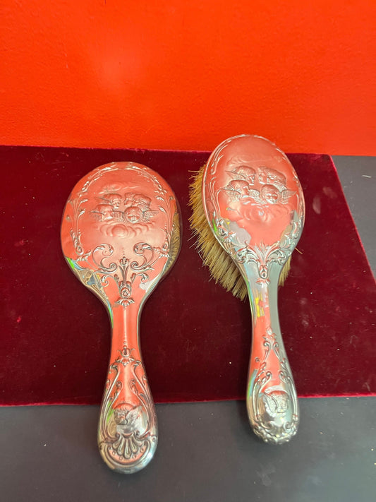 Stunning 10 inch long, English sterling cherub brush and mirror set  good condition and great gift