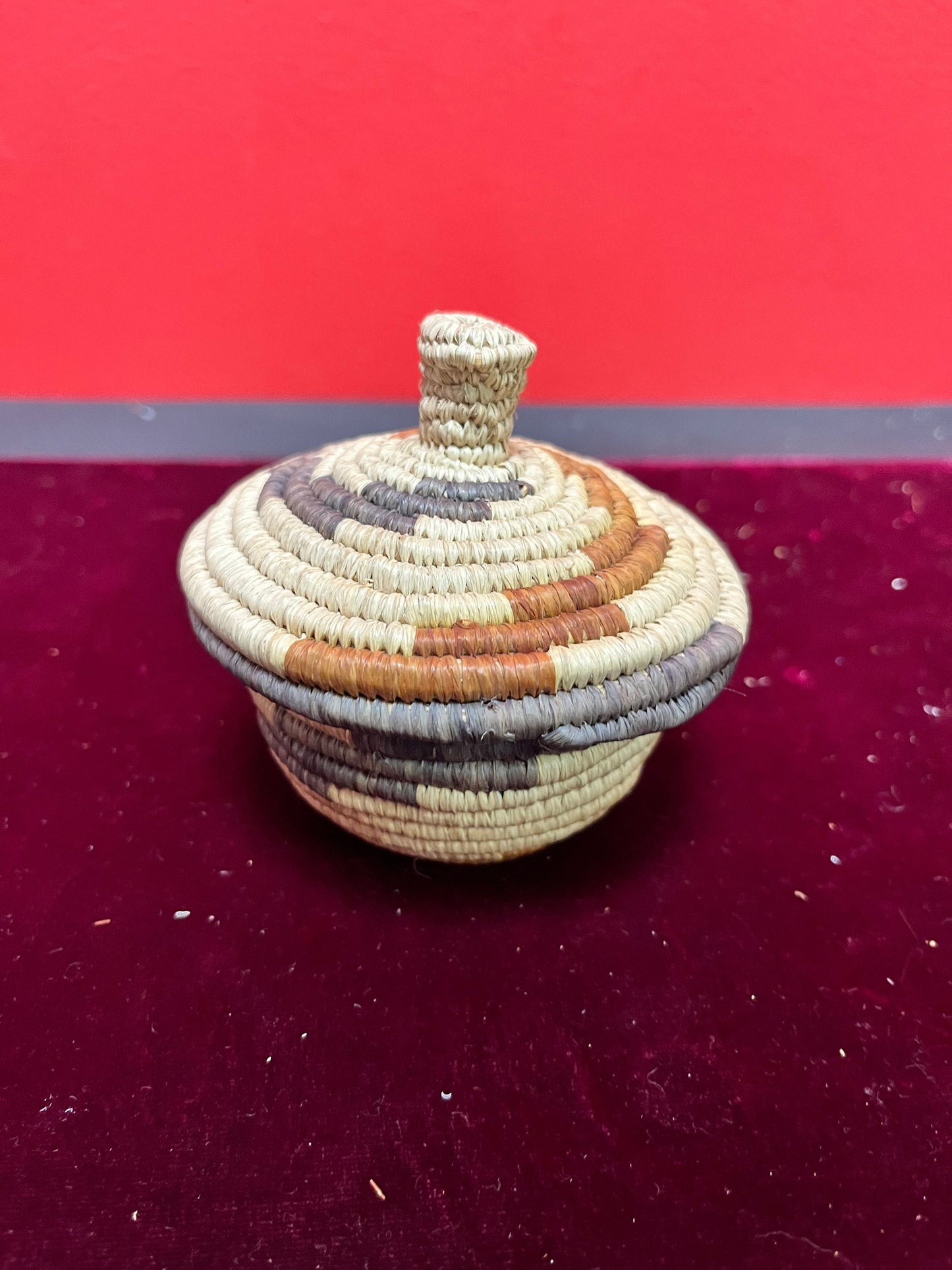 A  4 inch high Navajo southwestern woven lidded basket fabulous condition