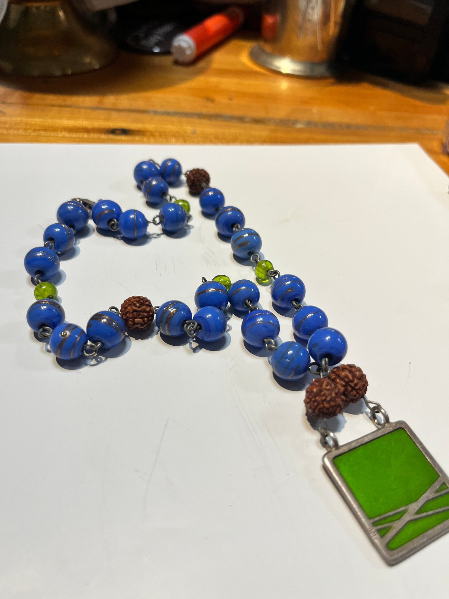 Approx 17 inch glass bead necklace with 1 inch cool pendant great gift