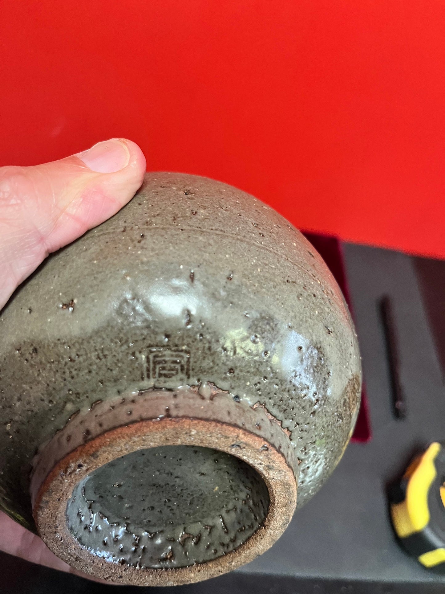 Lovely 7 inch tall Asian, glazed pottery vase  signed  unusual and cool  great  condition