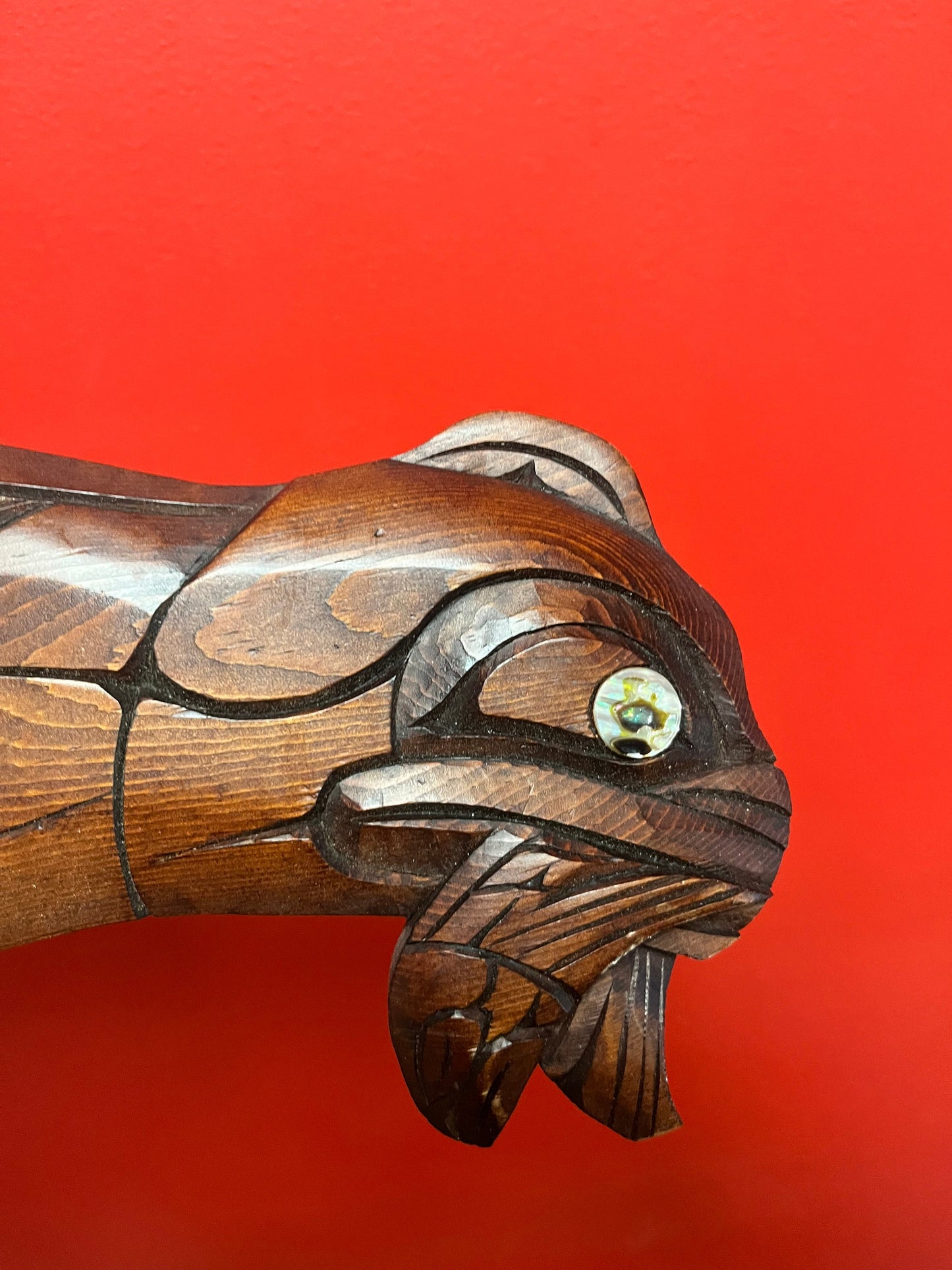 20 x 6 wide Indigenous First Nations Salish signed seal eating a salmon by Norman Bob