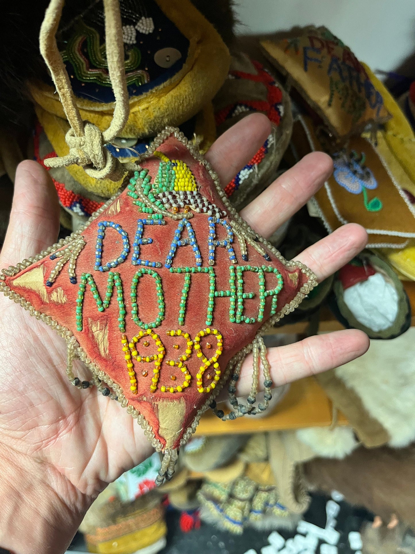 A  4 inch indigenous First Nations pacific northwest coast 1938 beaded cushion   mother   spectacular  as is