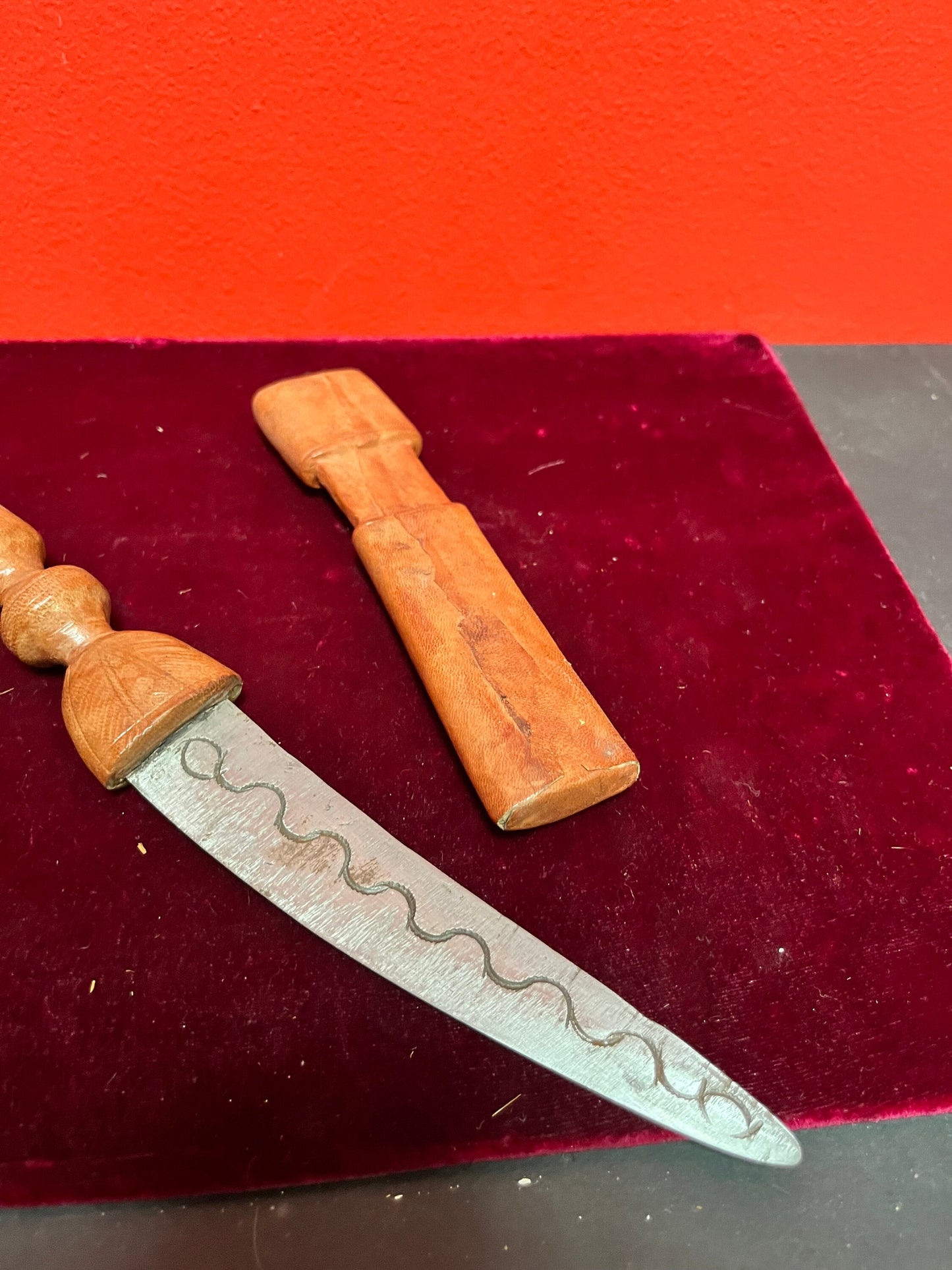 Very nice 11 inch long leather and steel knife in sheaf  older and fairly sharp