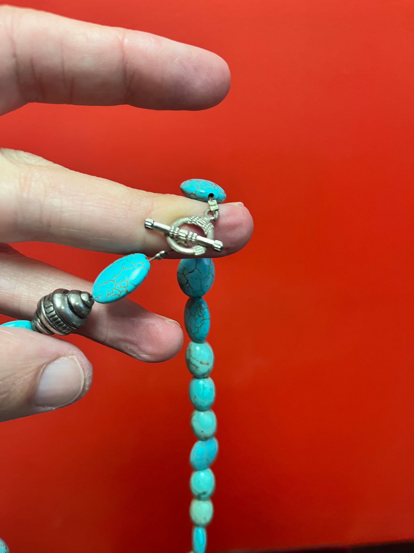 Approximately 20 inch long, turquoise and silver necklace