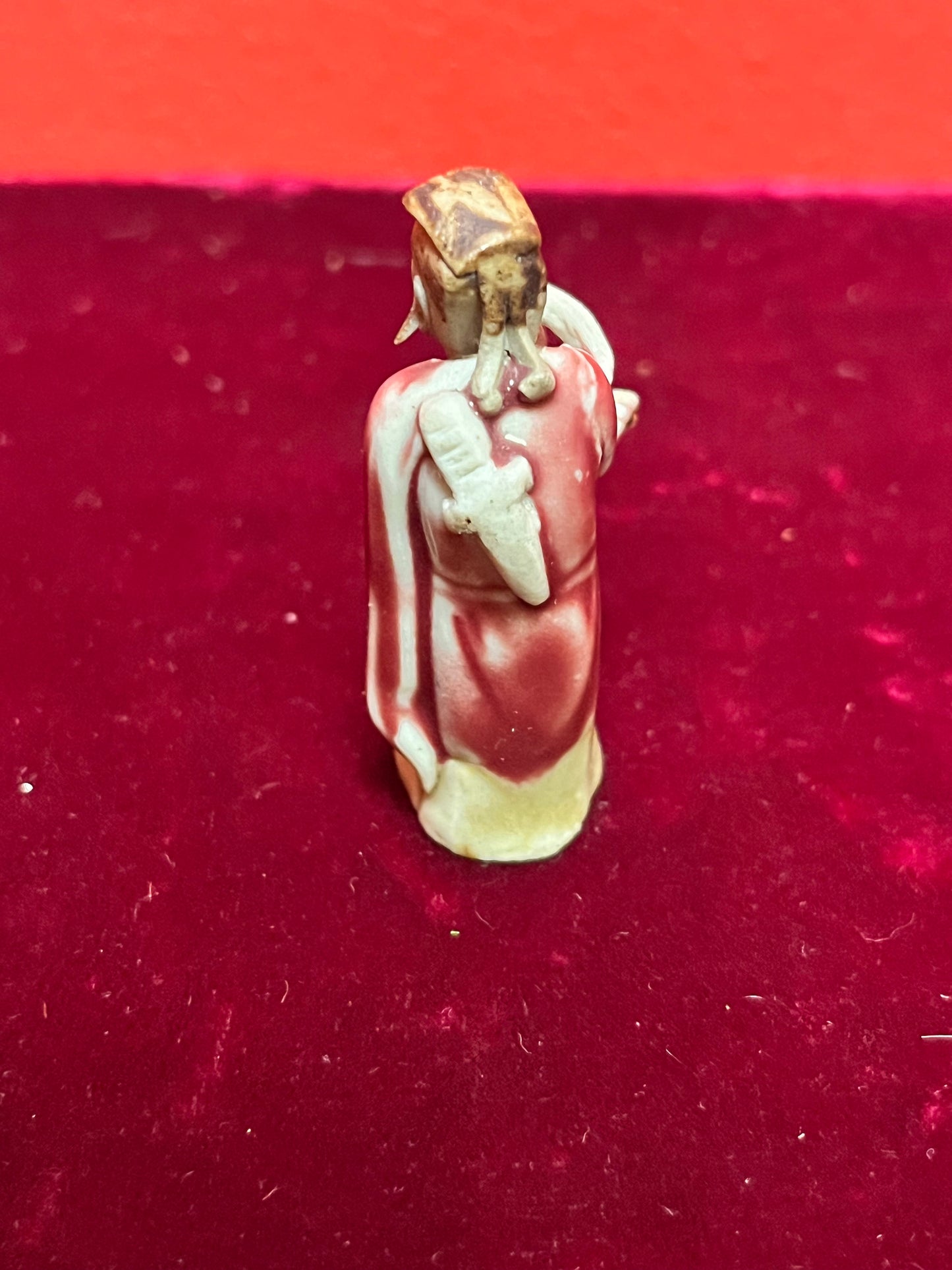 A  Fabulous 2 inch tall sang de boeuf mud man   incredible detail and fabulous condition - wow