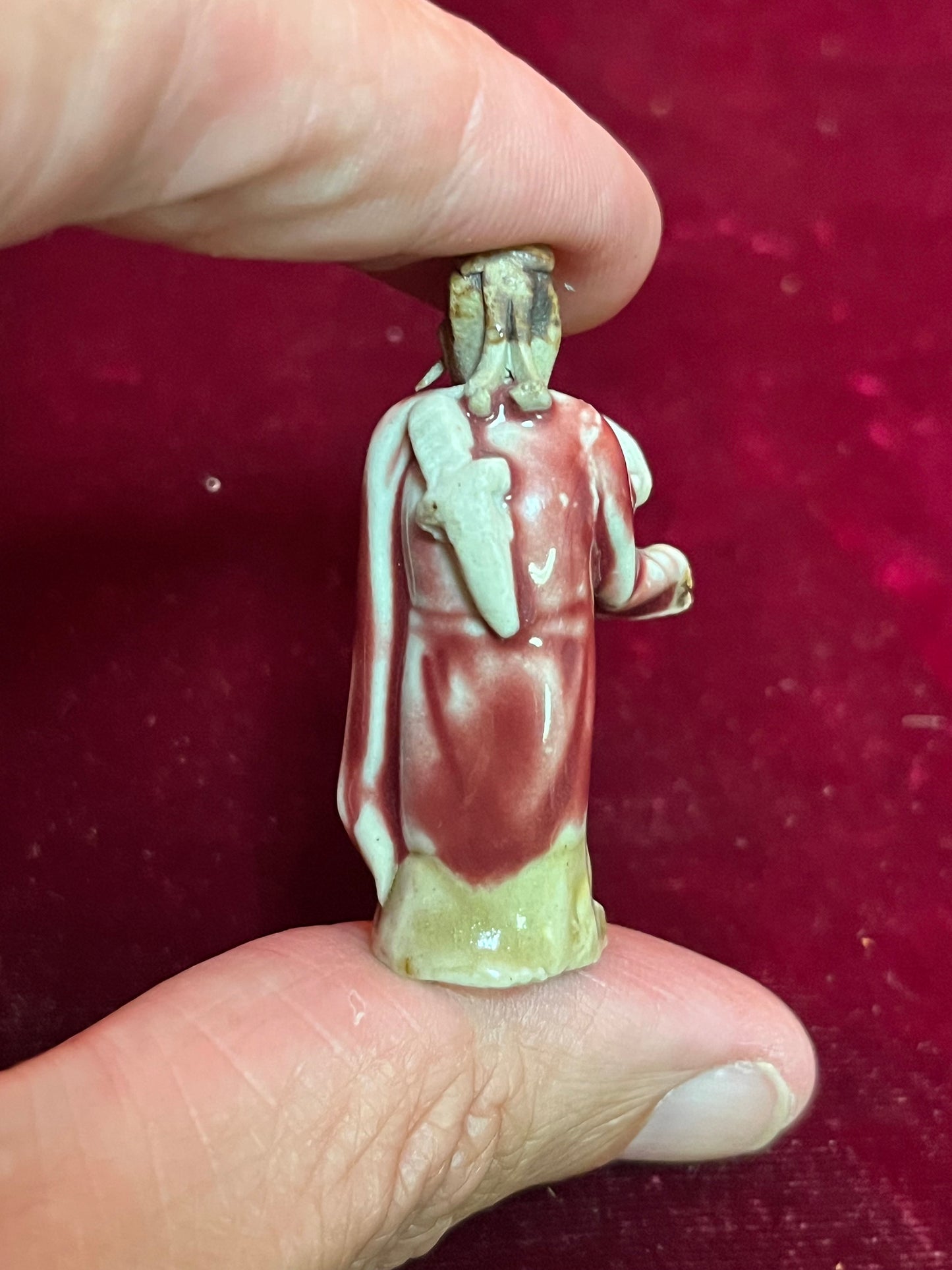 A  Fabulous 2 inch tall sang de boeuf mud man   incredible detail and fabulous condition - wow