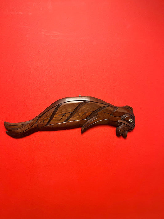 20 x 6 wide Indigenous First Nations Salish signed seal eating a salmon by Norman Bob