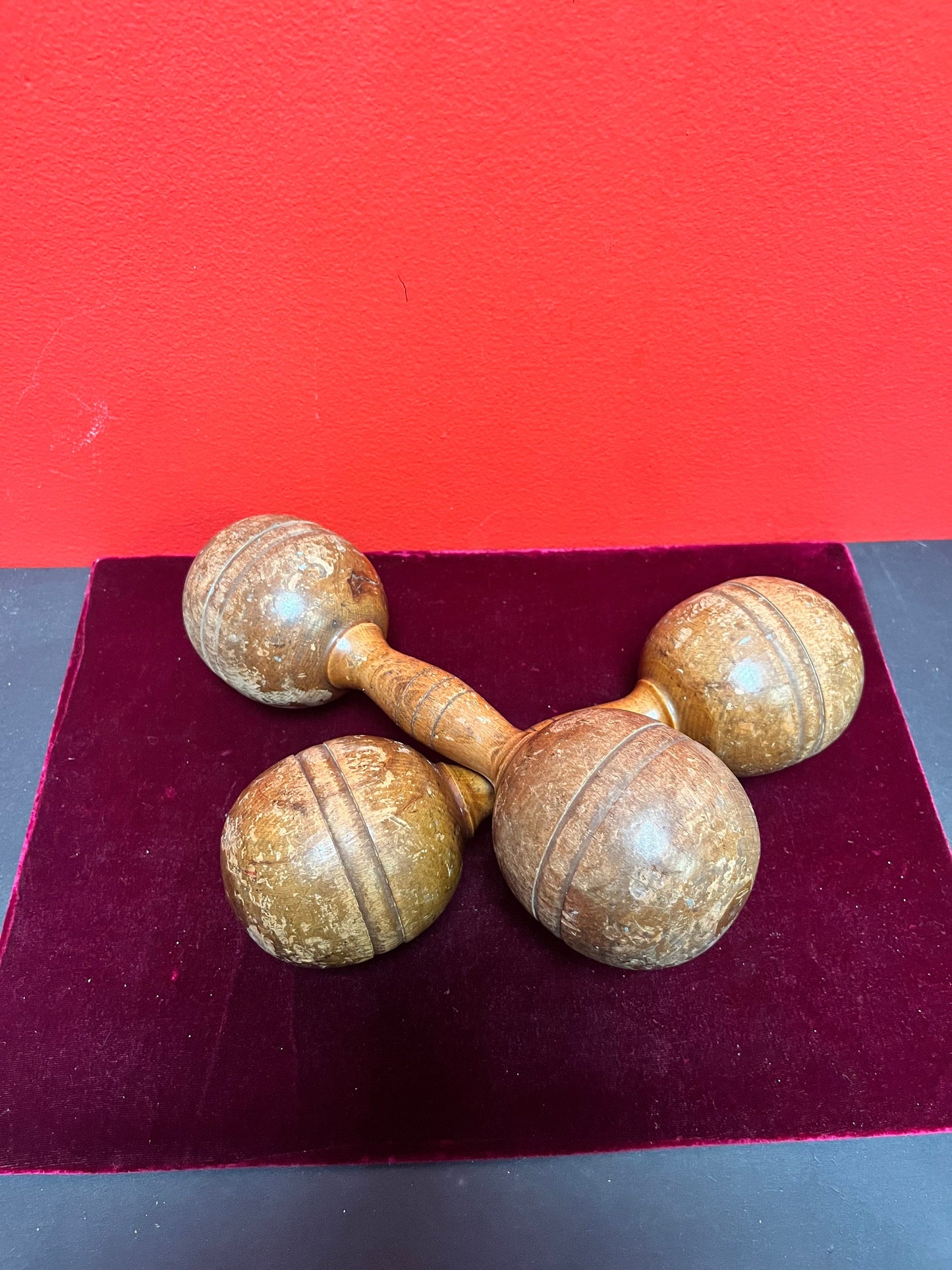 Antique 10 inch long, approximately 2 pounds each wooden dumbbells   used condition  so cool