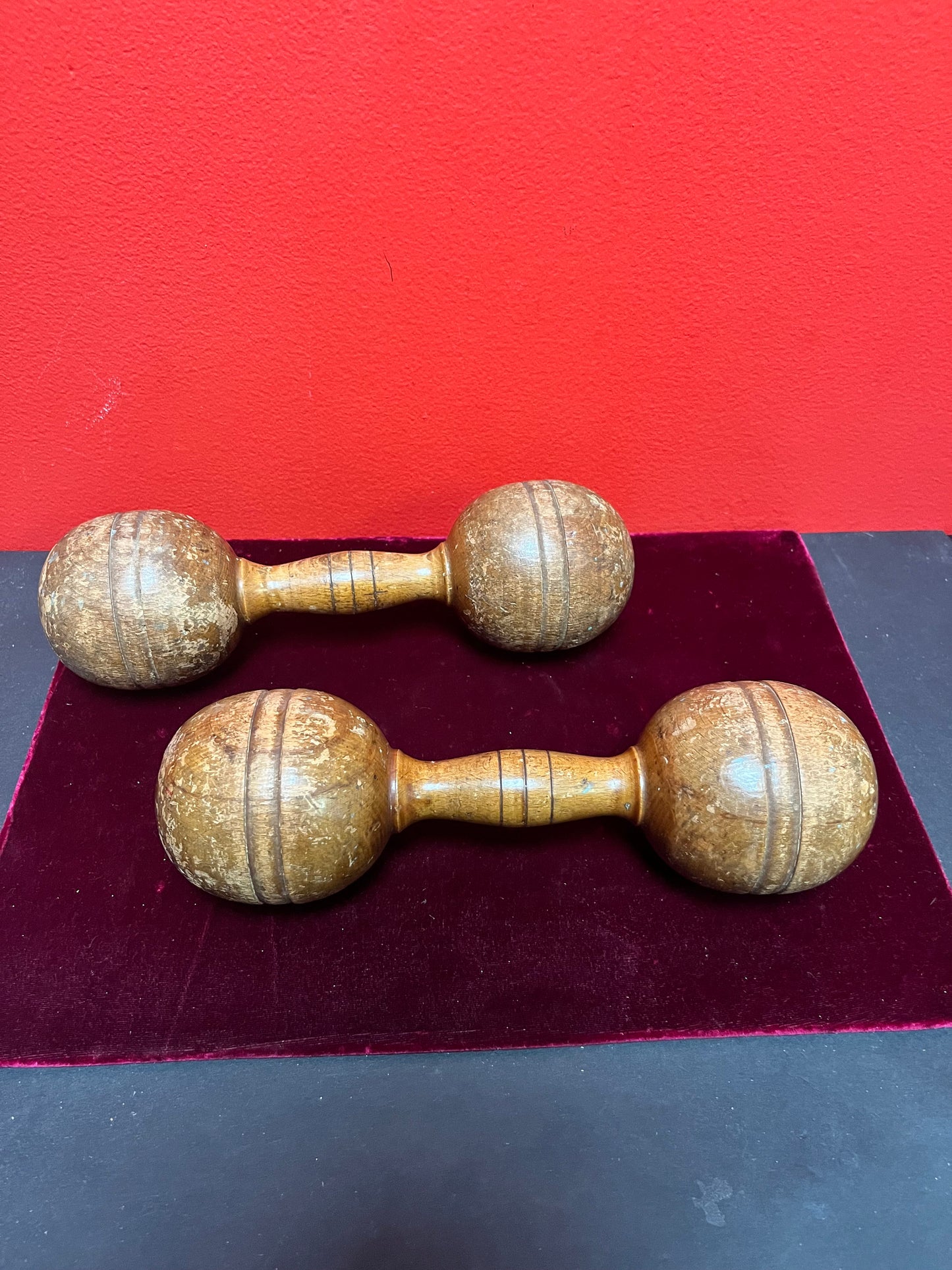 Antique 10 inch long, approximately 2 pounds each wooden dumbbells   used condition  so cool