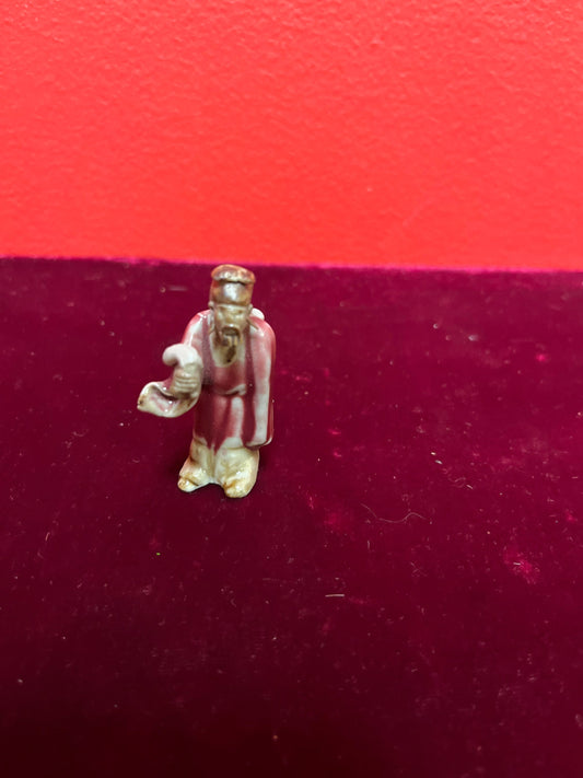 A  Fabulous 2 inch tall sang de boeuf mud man   incredible detail and fabulous condition - wow