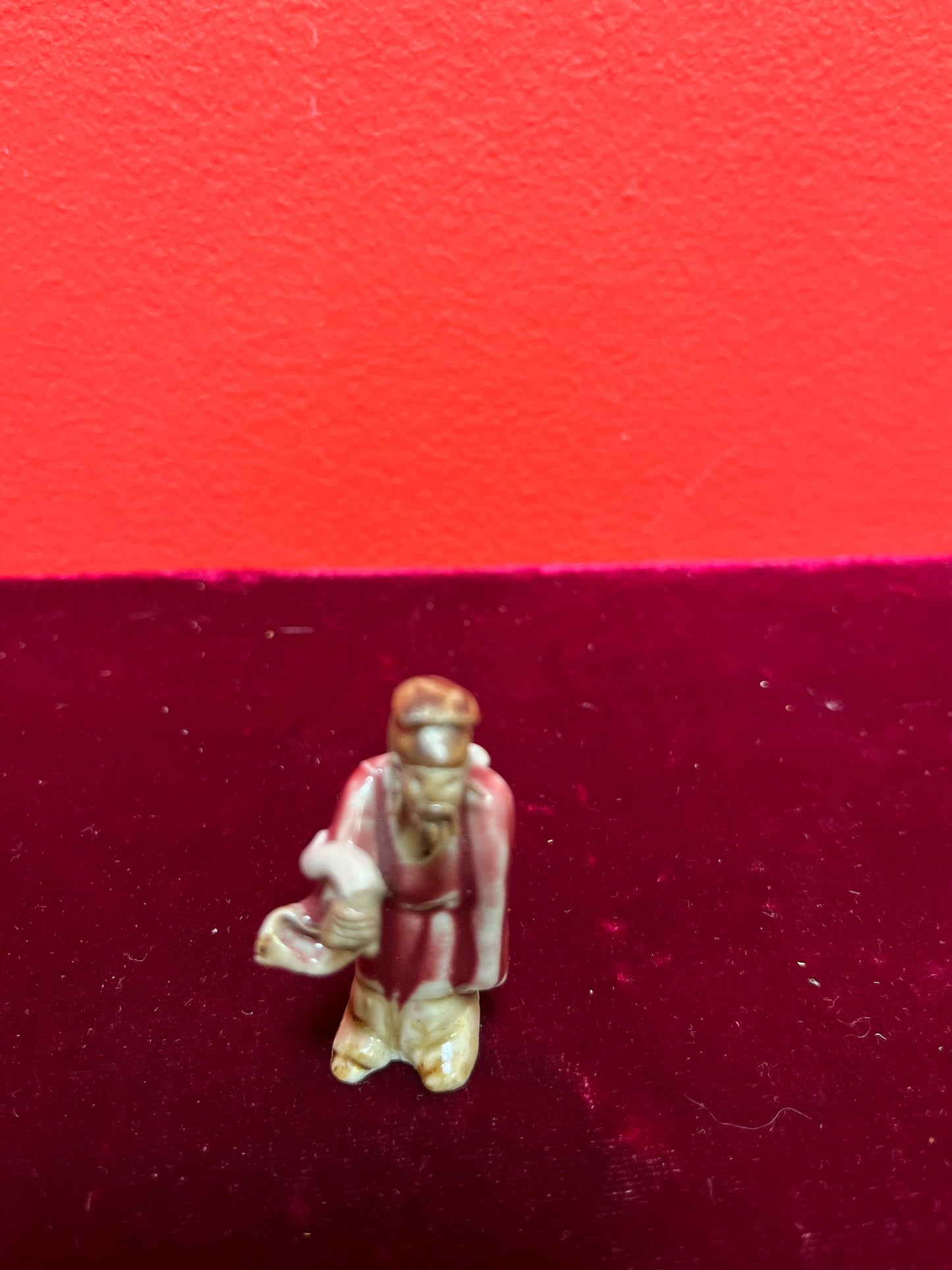 A  Fabulous 2 inch tall sang de boeuf mud man   incredible detail and fabulous condition - wow