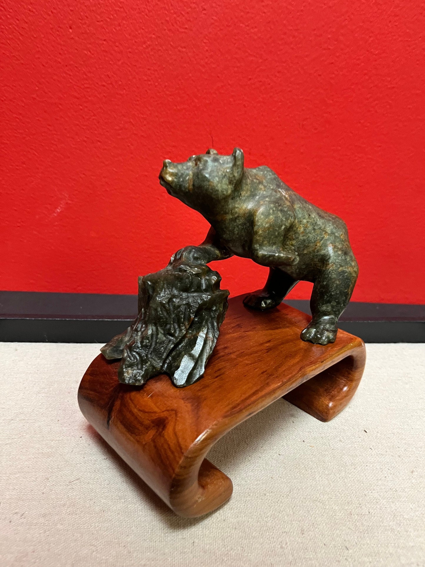 Lovely 6 x 7 high indigenous inuit soapstone bear statue mounted on a Chinese Rosewood stand  a happy marriage