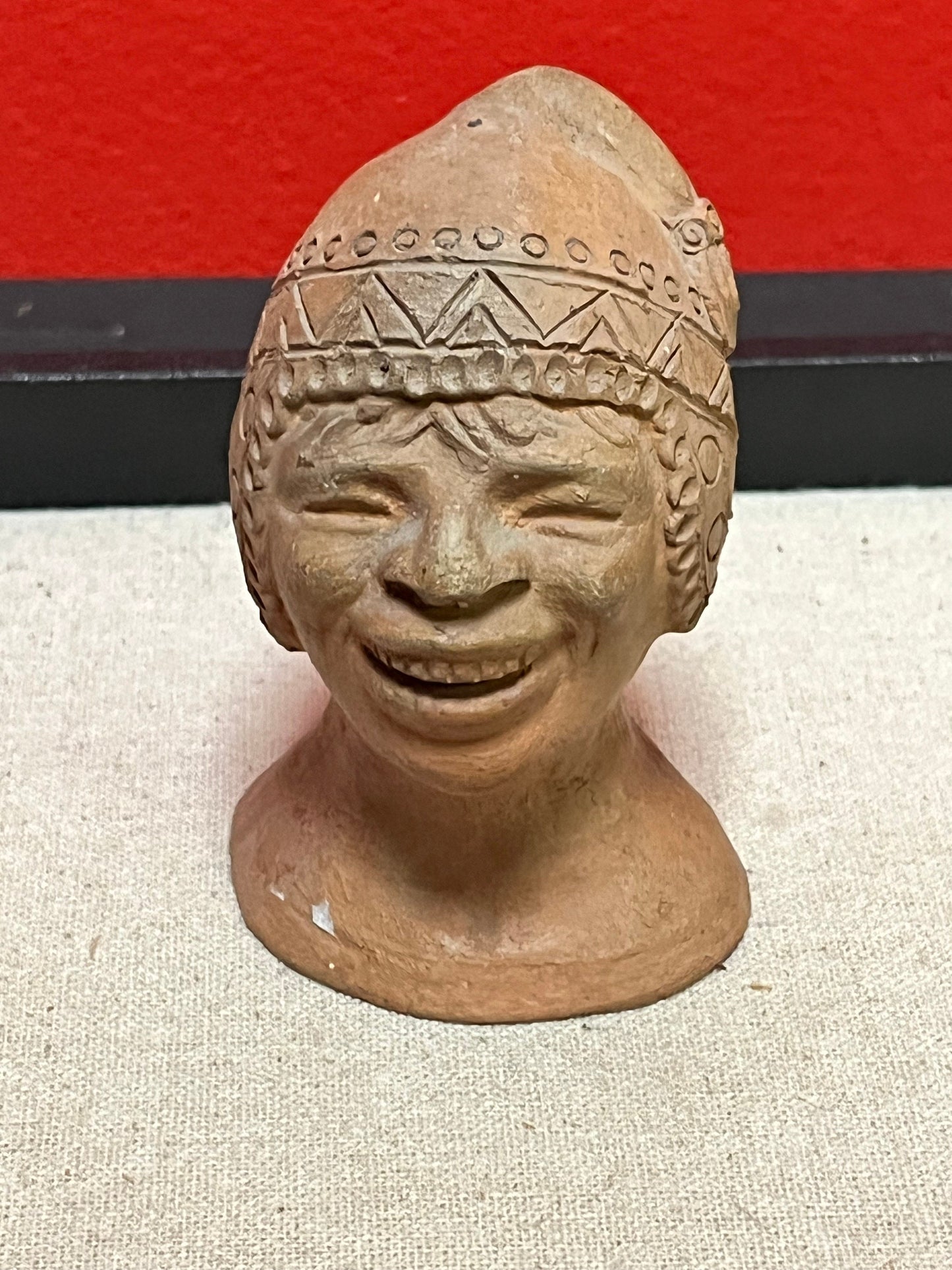 Cool 4 inch high terra-cotta head depicting a mans face   unique gift