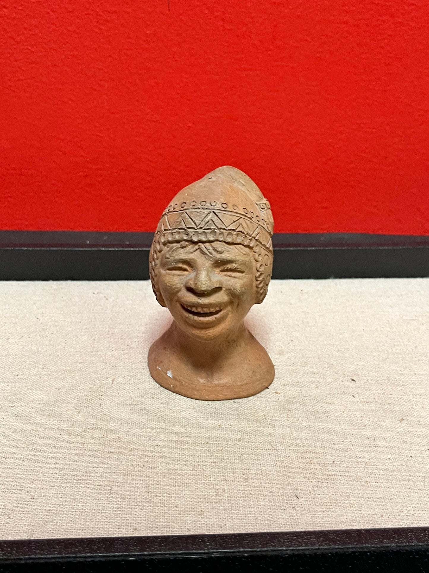 Cool 4 inch high terra-cotta head depicting a mans face   unique gift