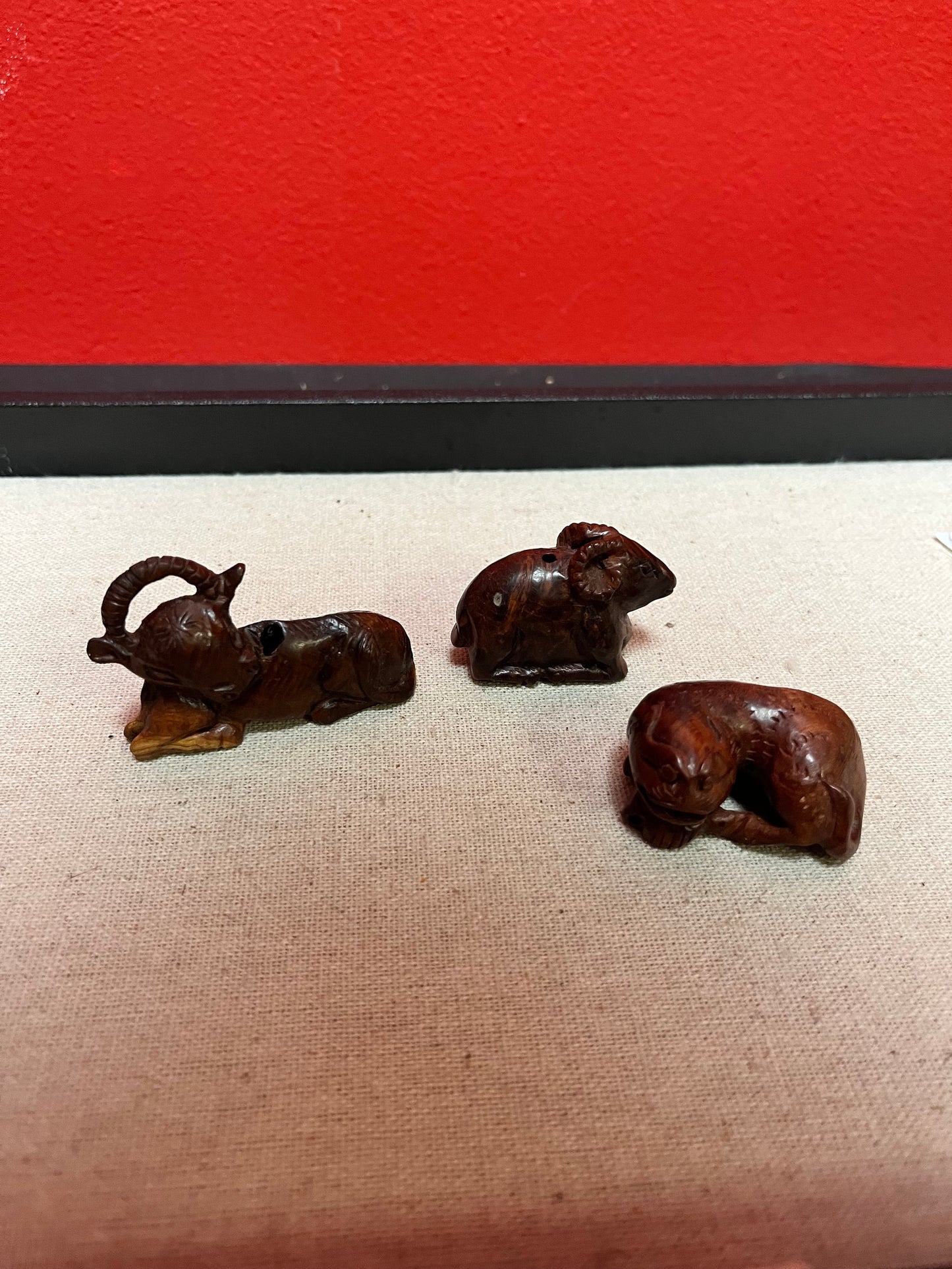 Three Antique Japnese wooden Netsukes  lovely condition  price for all  1.5 to 2 inch each