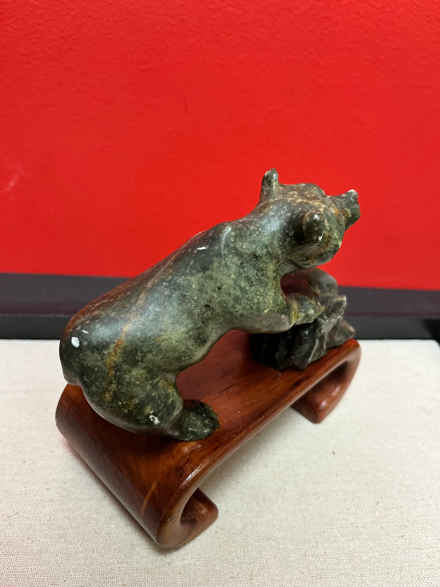 Lovely 6 x 7 high indigenous inuit soapstone bear statue mounted on a Chinese Rosewood stand  a happy marriage