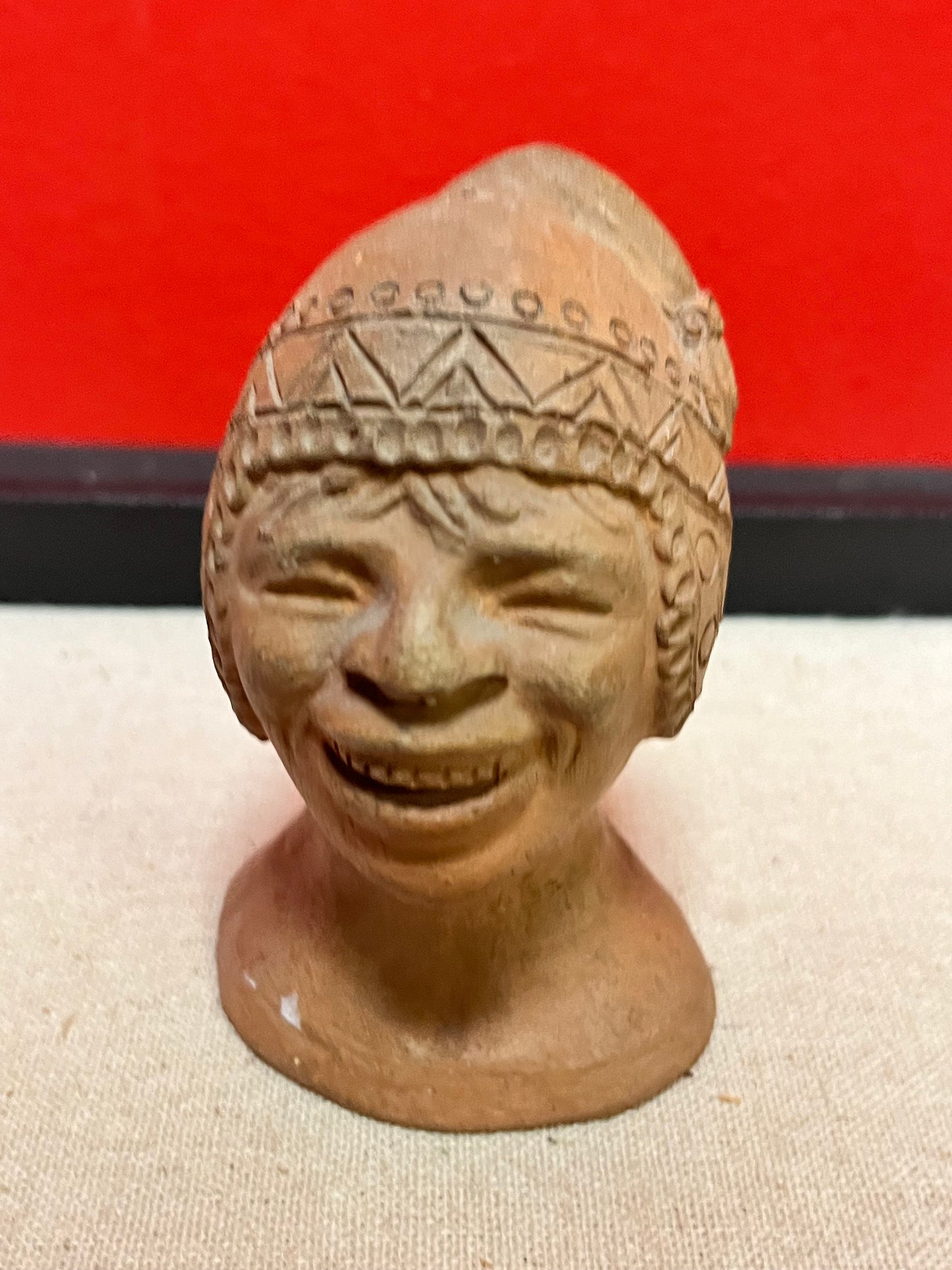 Cool 4 inch high terra-cotta head depicting a mans face   unique gift